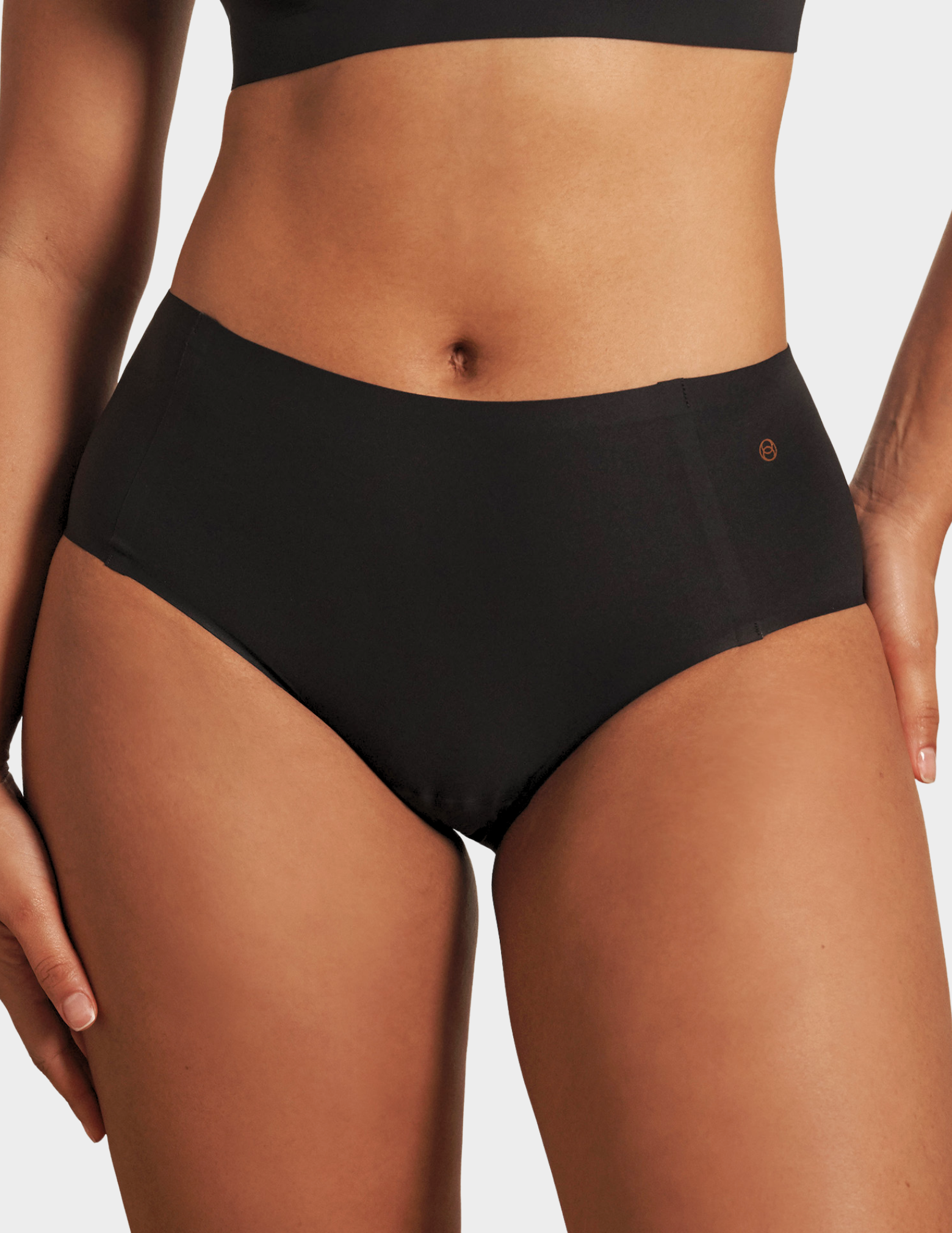 Front view of a model wearing Evelyn & Bobbie high waist brief in Black