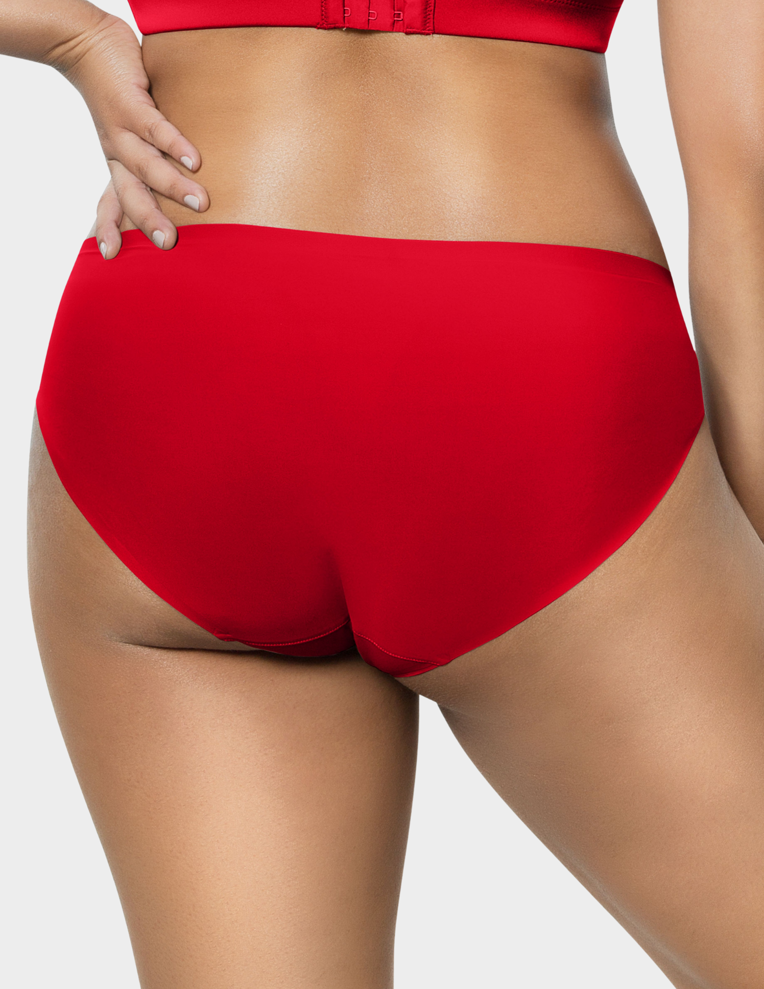 Back view of a model wearing Parfait Bonded hipster panty in racing red