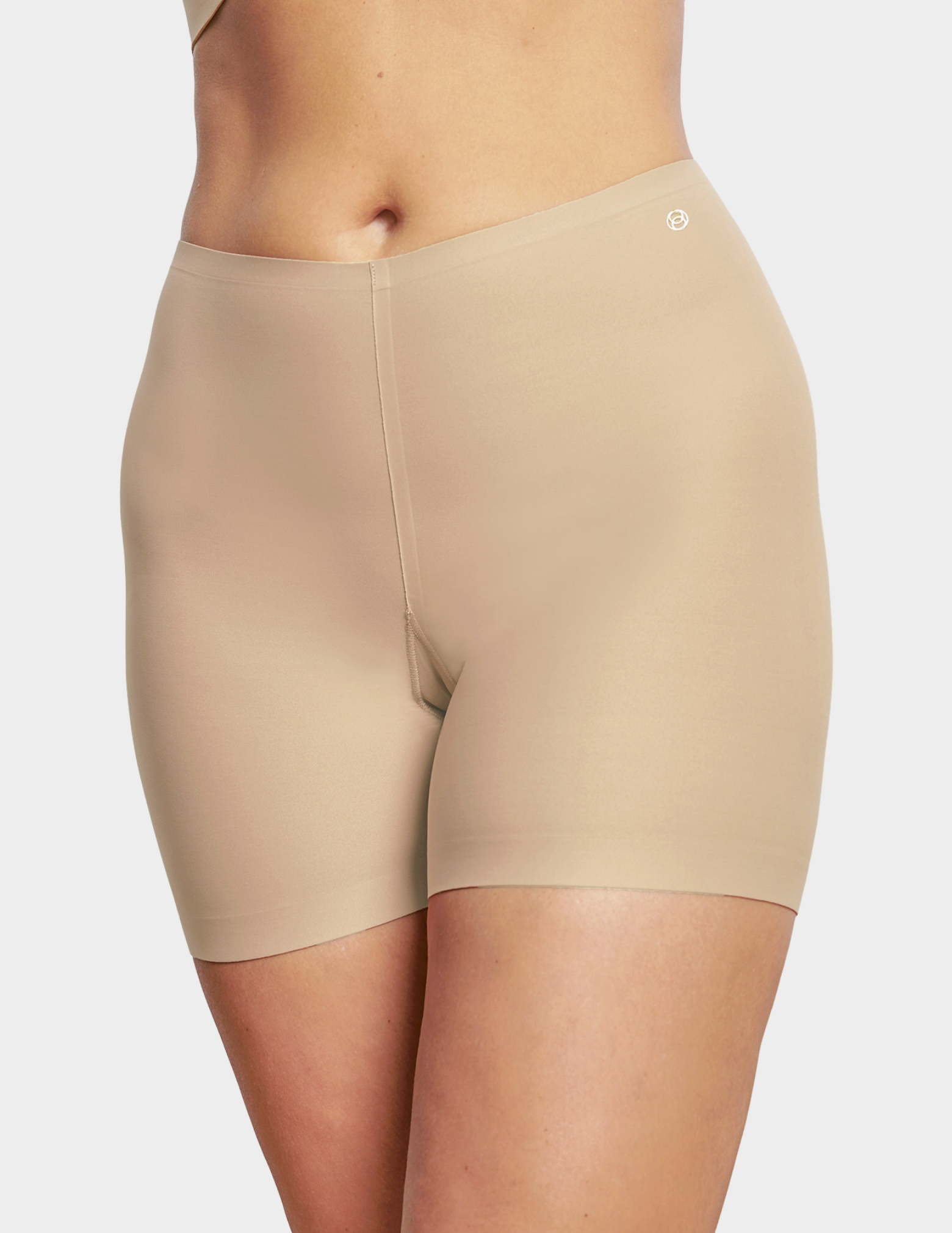 Front view of a model wearing Evelyn & Bobbie girlshort in Sand