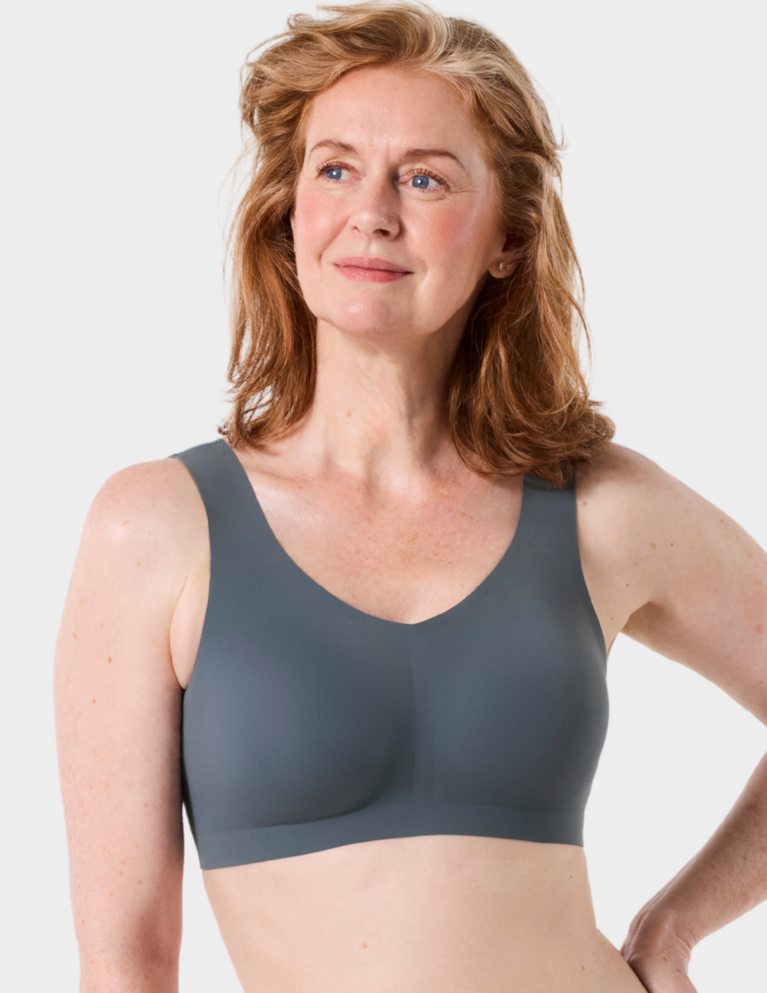 Front view of a model wearing Evelyn & Bobbie Defy bra in Slate Grey