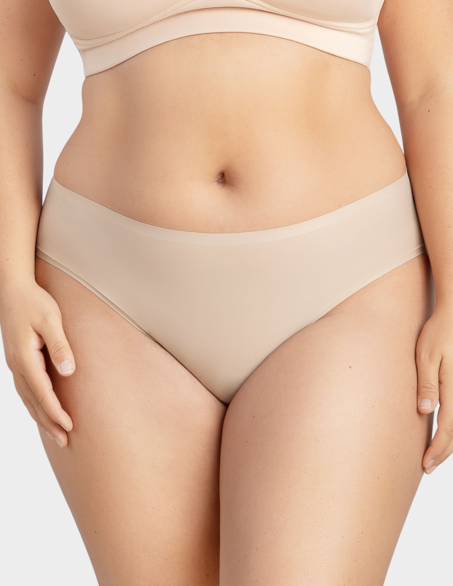 Front view of a model wearing Parfait Bonded hipster panty in european nude