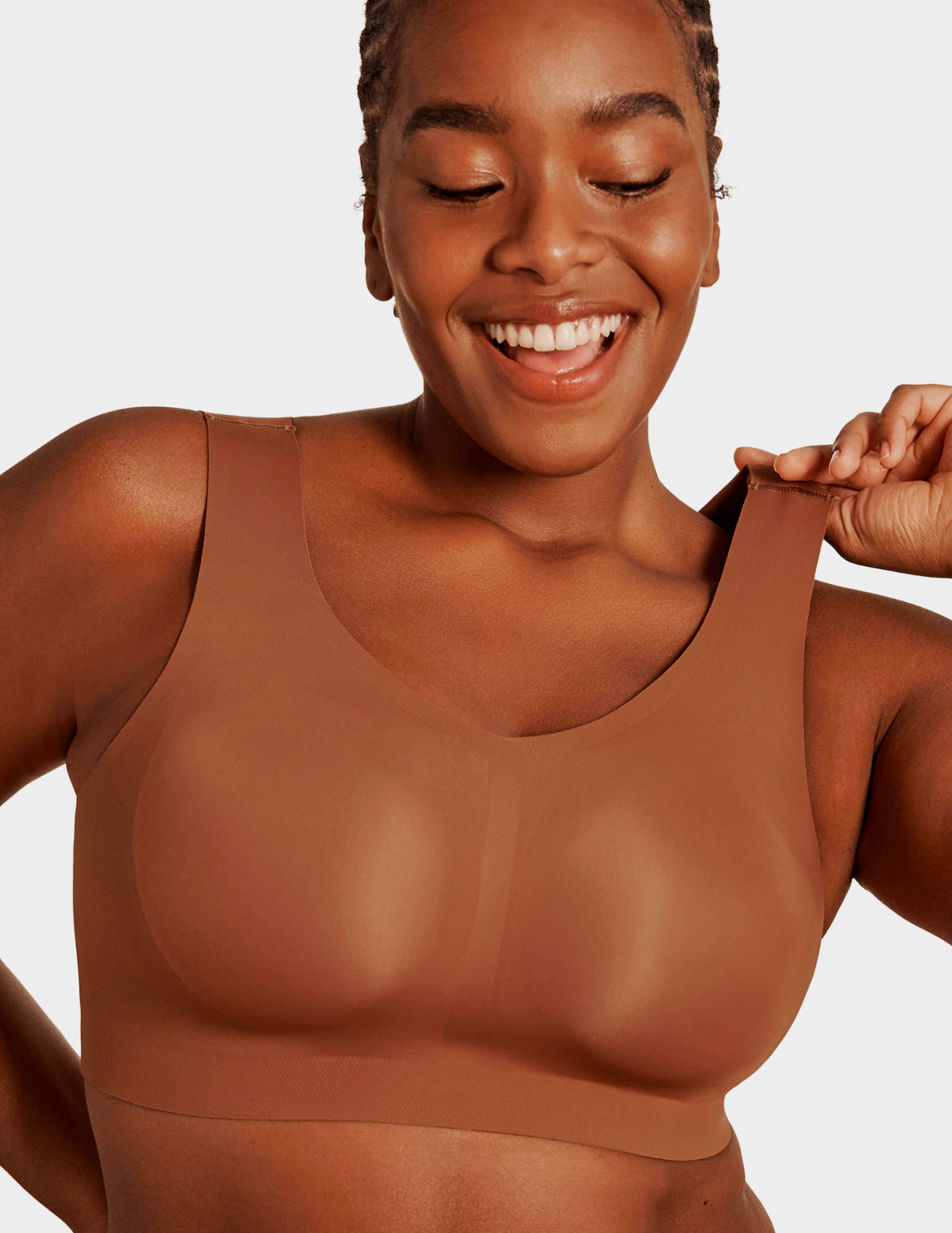 Front view of a model wearing Evelyn & Bobbie Defy bra in Clay