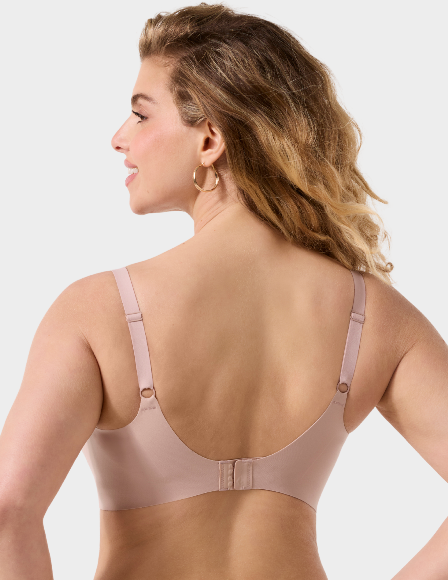 Back view of a model wearing Evelyn & Bobbie Beyond bra in Petal Drift