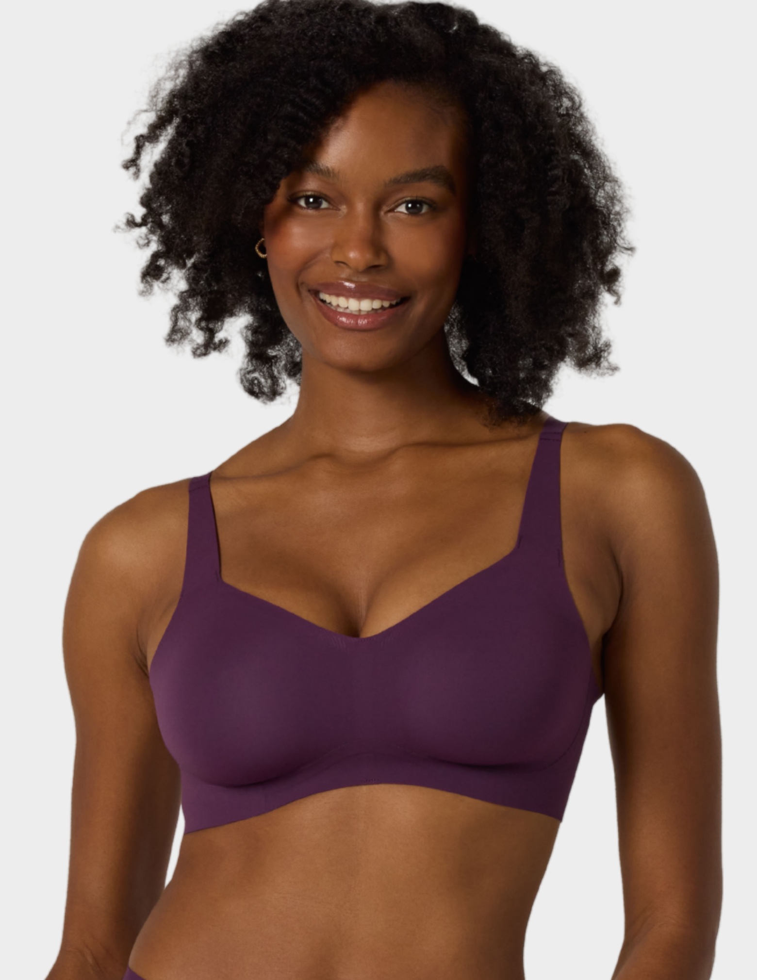 Front view of a model wearing Evelyn & Bobbie Beyond bra in Plum