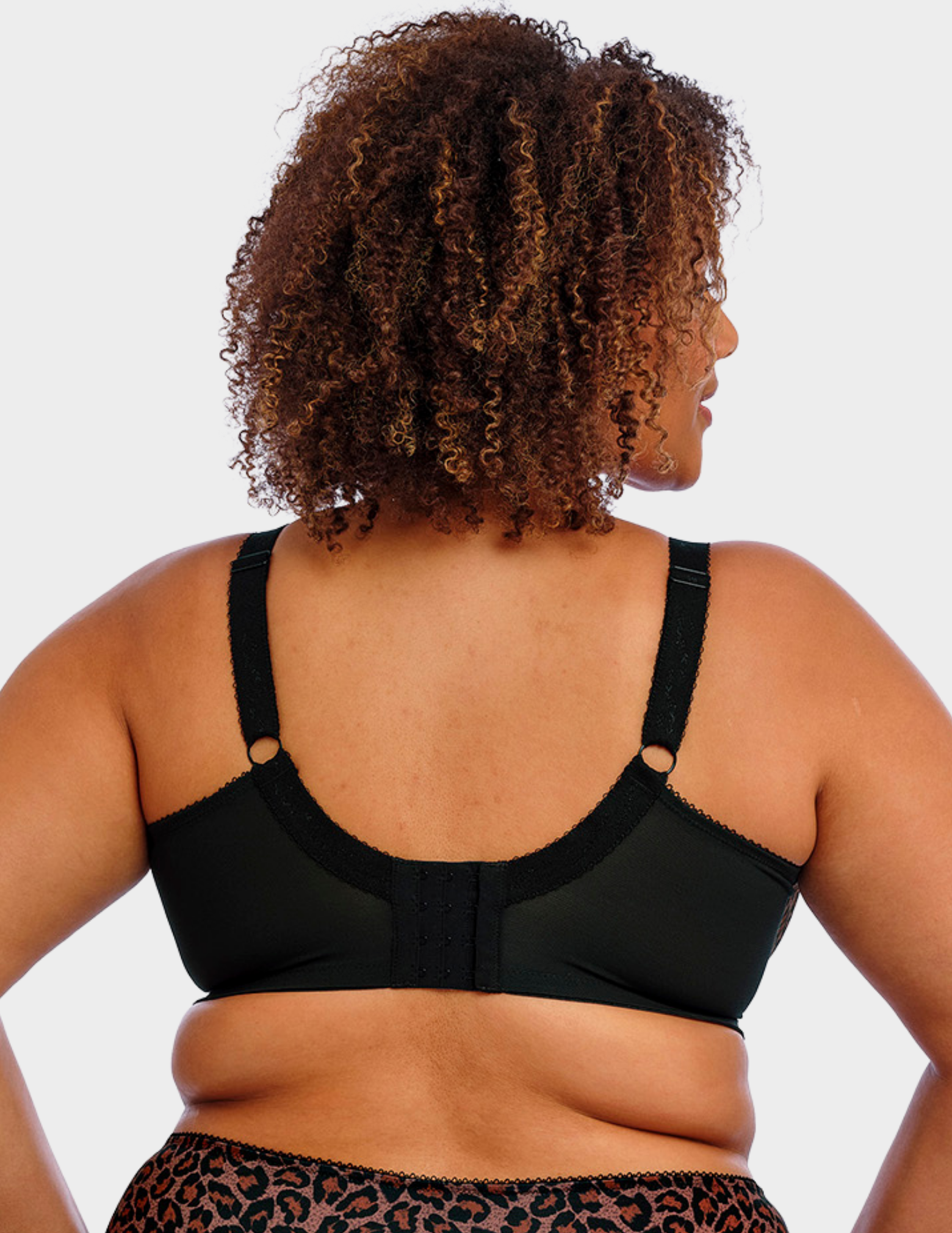 Back view of a model wearing Goddess Kayla bra in dark leopard