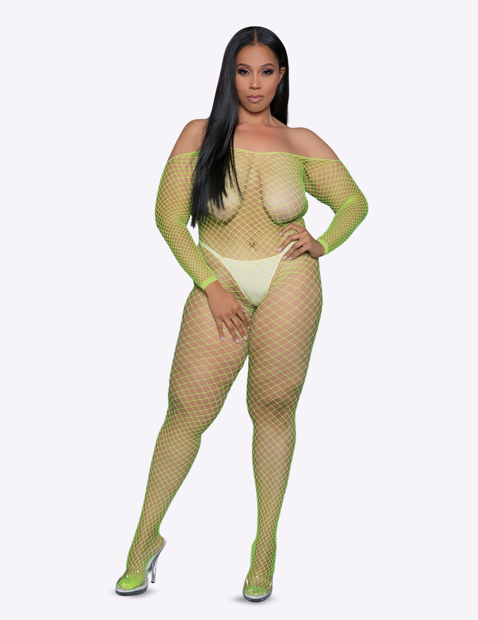 Model wearing a fishnet outfit with green accents on a white background
