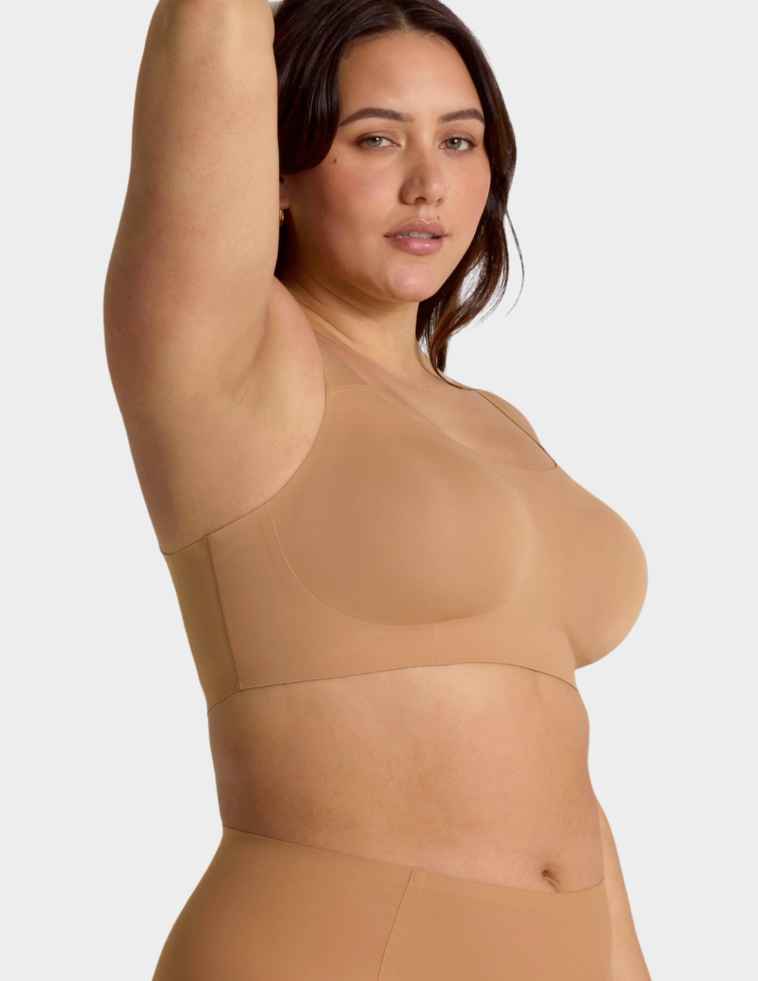 Side view of a model wearing Evelyn & Bobbie Structured Scoop Bra in Mica