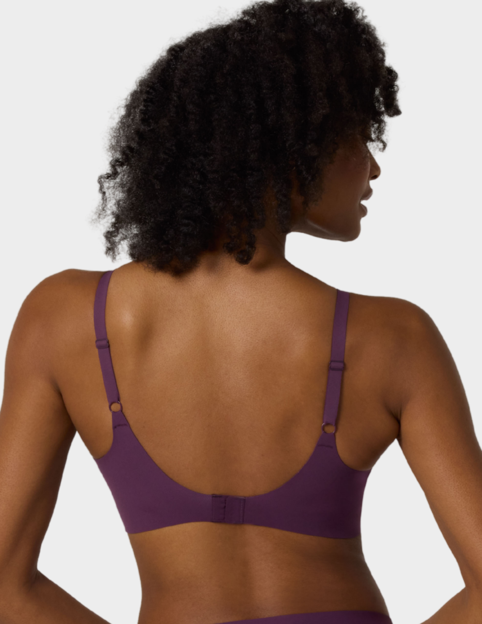 Back view of a model wearing Evelyn & Bobbie Beyond bra in Plum