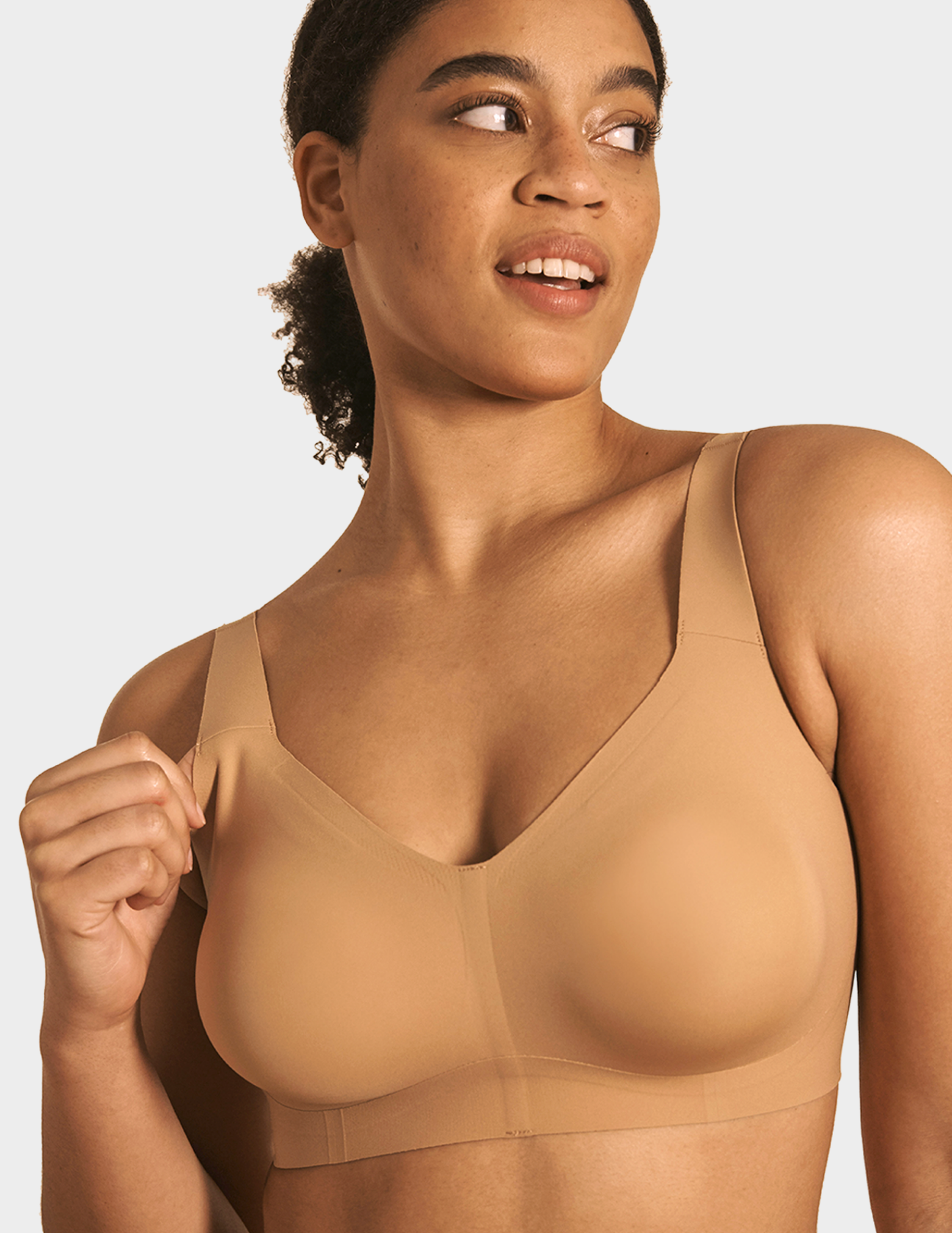 Front view of a model wearing Evelyn & Bobbie Beyond bra in Mica