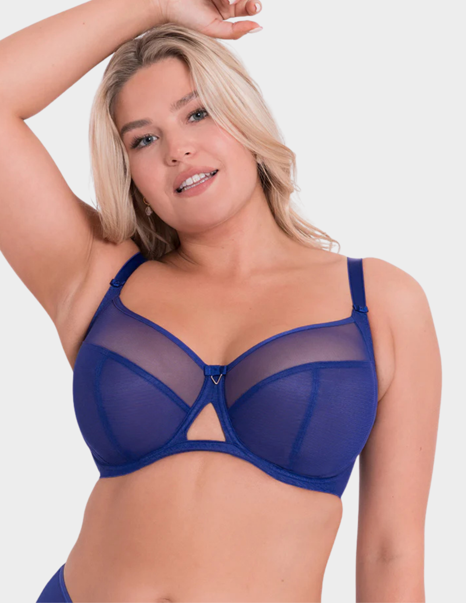 Front view of a model wearing Curvy Kate Victory bra in Electric Blue