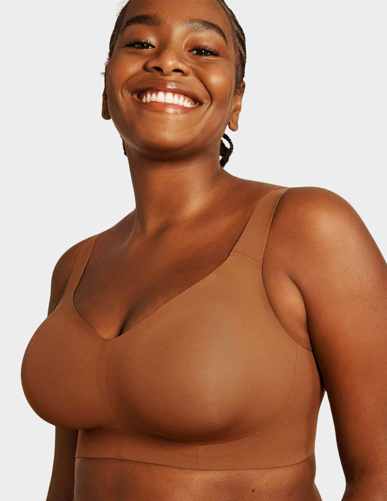 Front view of a model wearing Evelyn & Bobbie Beyond bra in Clay