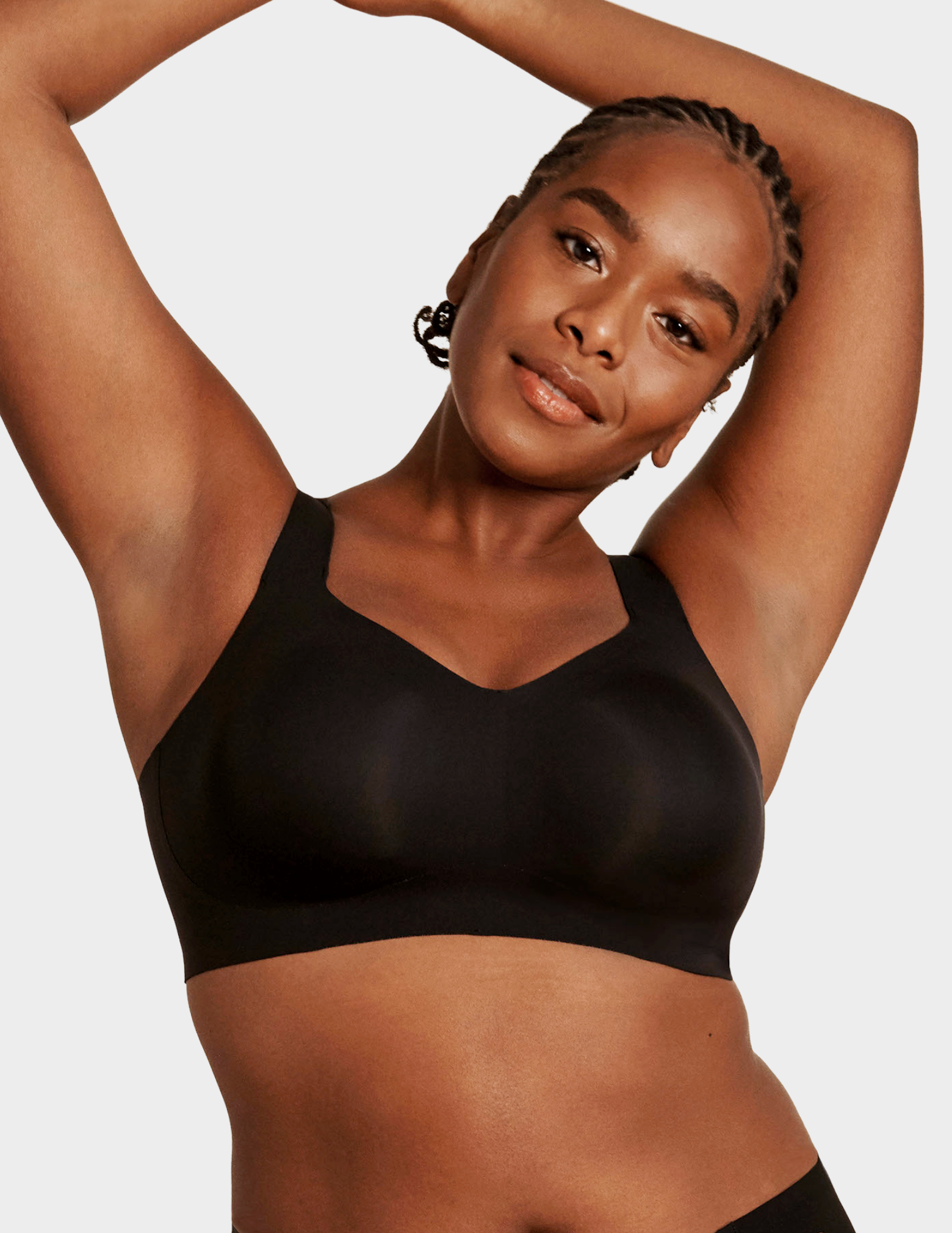 Front view of a model wearing Evelyn & Bobbie Beyond bra in Black