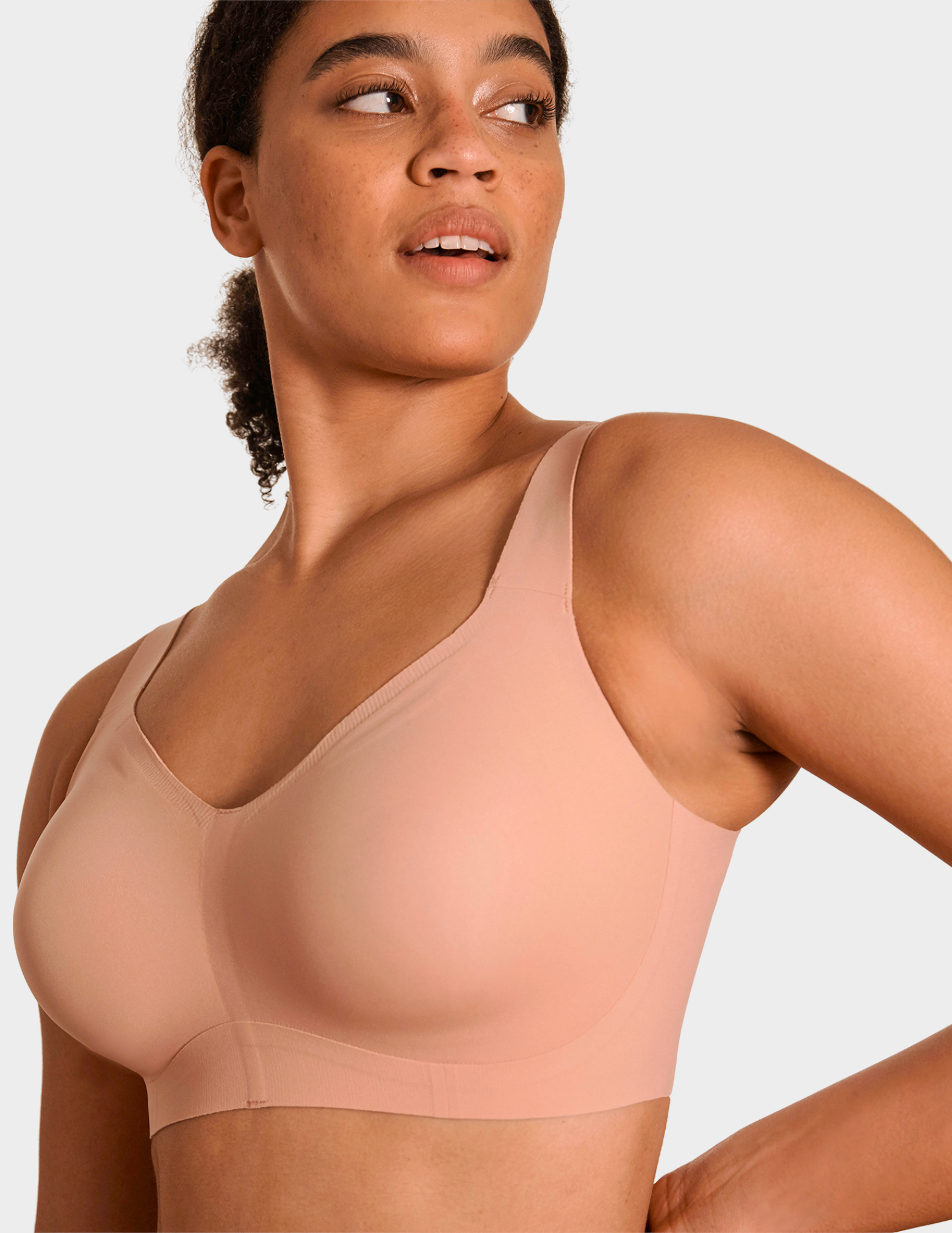 Front view of a model wearing Evelyn & Bobbie Beyond bra in Himalayan Salt