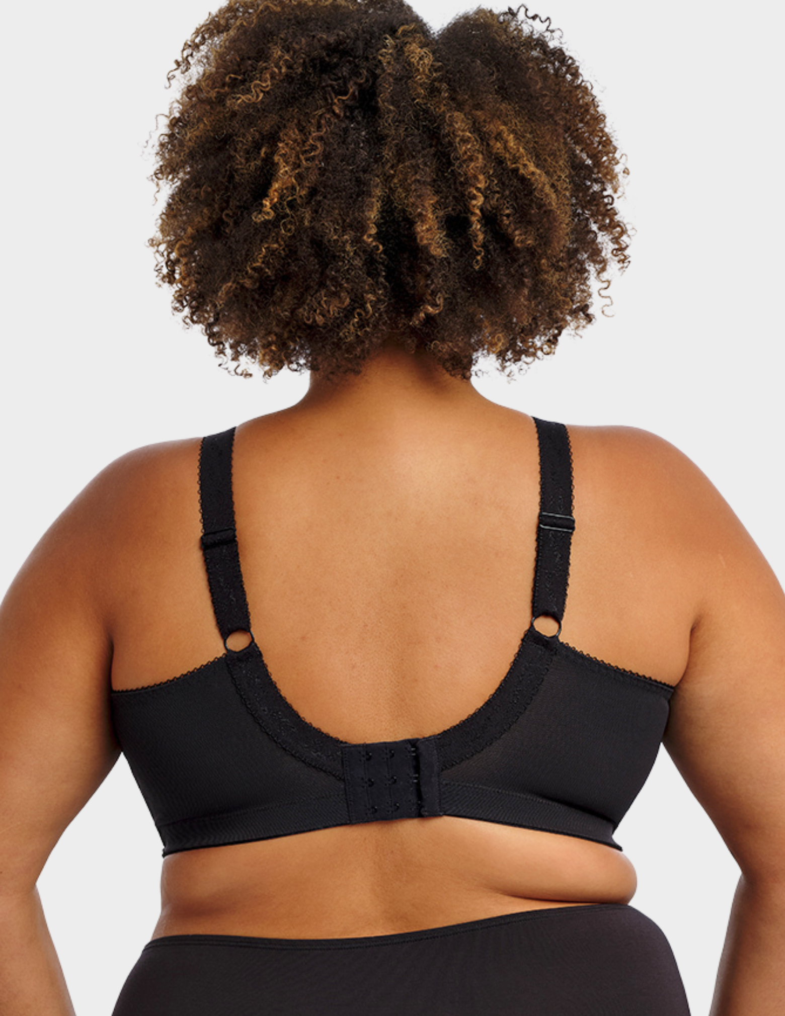 Back view of a model wearing Goddess Keira soft cup bra in black