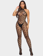 Front view of a model wearing a black heart patterned lace bodystocking