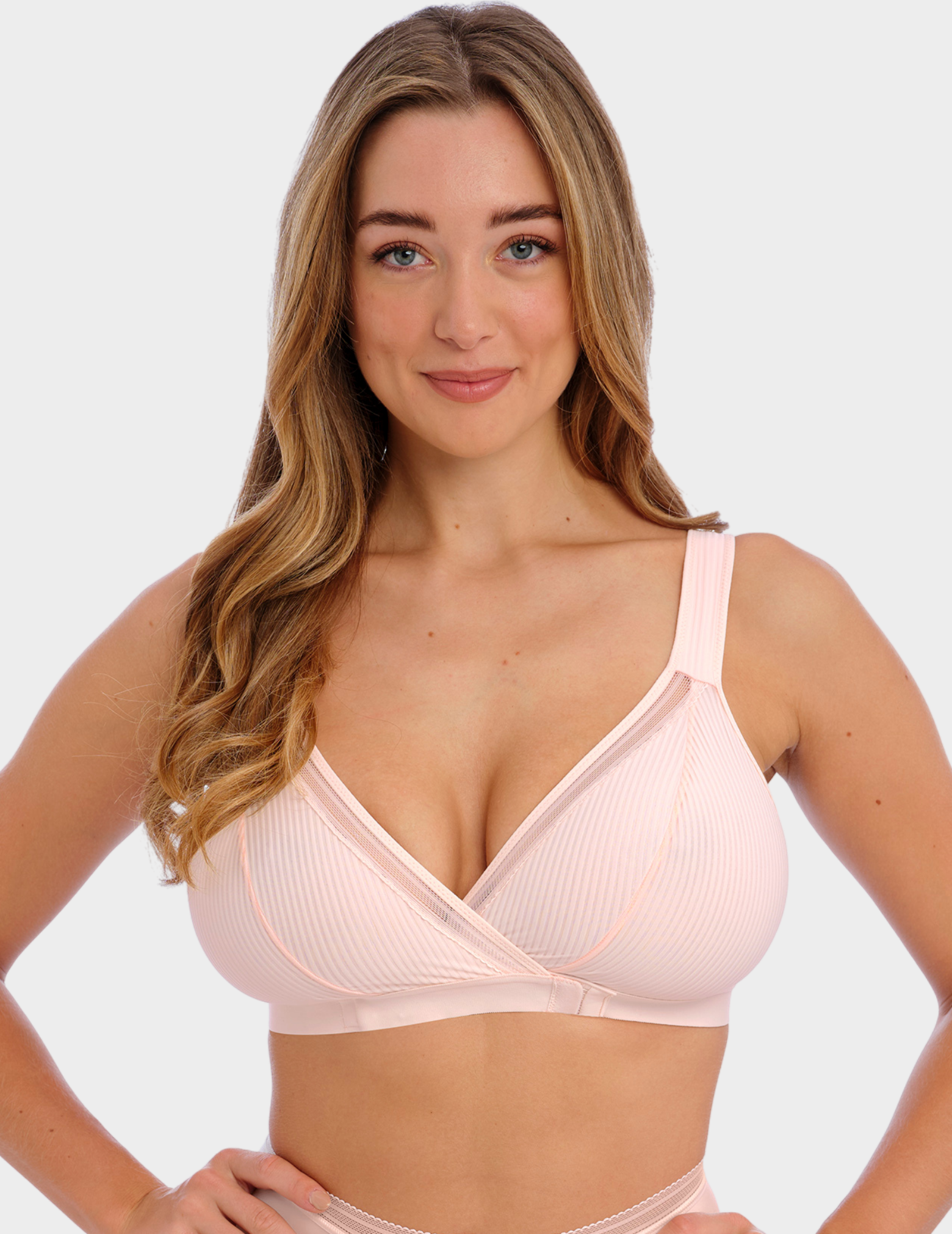 Front view of a model wearing Fantasie Fusion front close bra in Blush