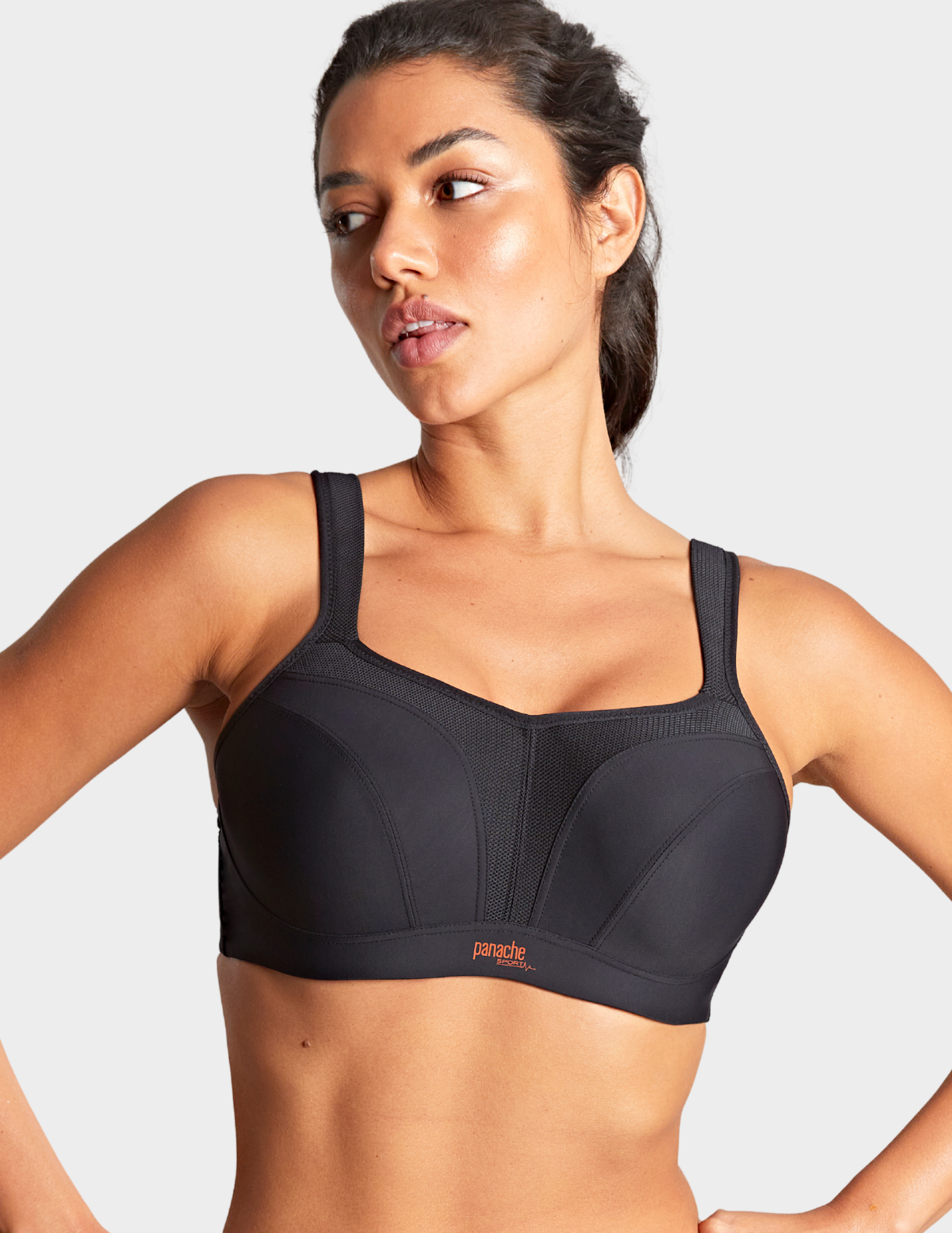 Front view of a model wearing Panache Power sports bra in black