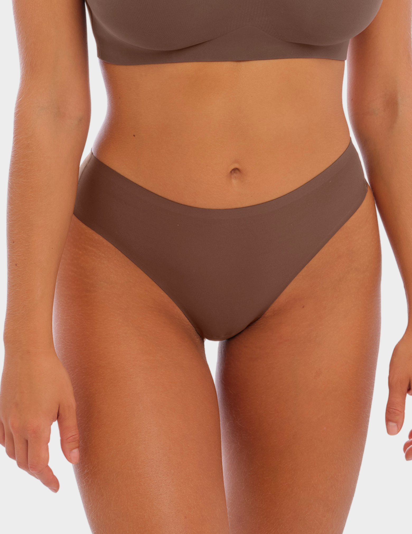 Front view of a model wearing Fantasie Smoothease thong in Coffee Roast