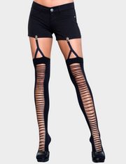 Front view of a model wearing black clip on thigh highs with lace up detail