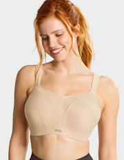 Front view of a model wearing Panache Power sports bra in Latte