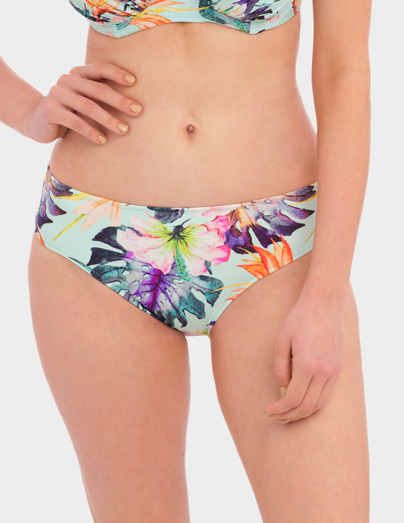 Front view of a model wearing Fantasie Paradiso swim brief in Soft Mint