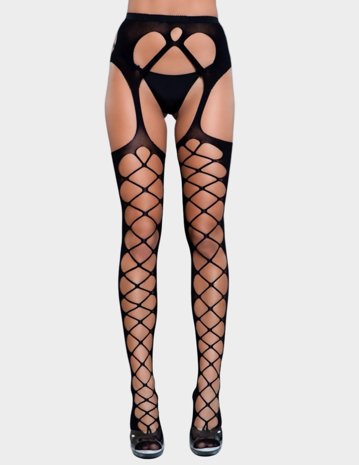 Front view of a model wearing black tights with cutout details