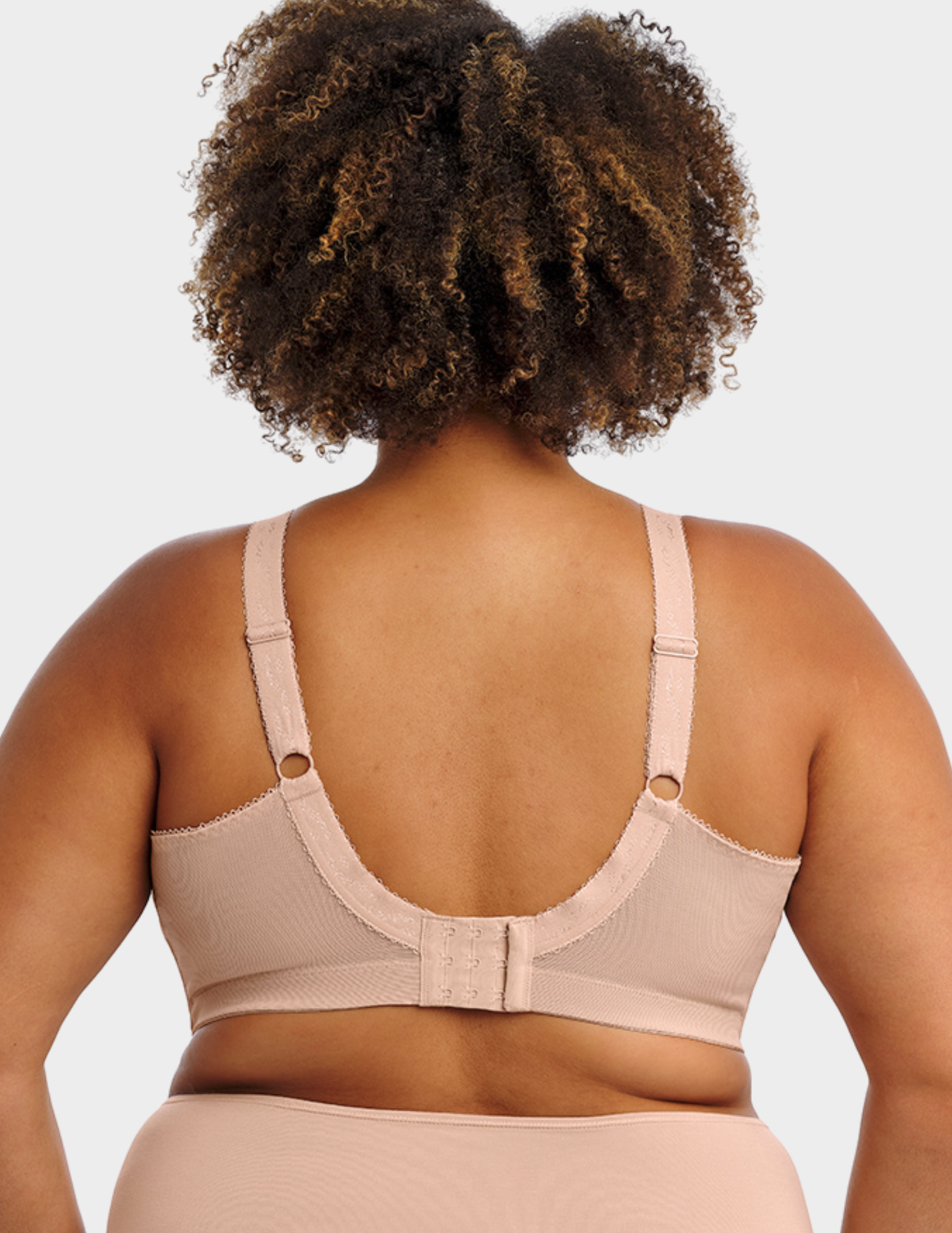 Back view of a model wearing Goddess Keira soft cup bra in fawn
