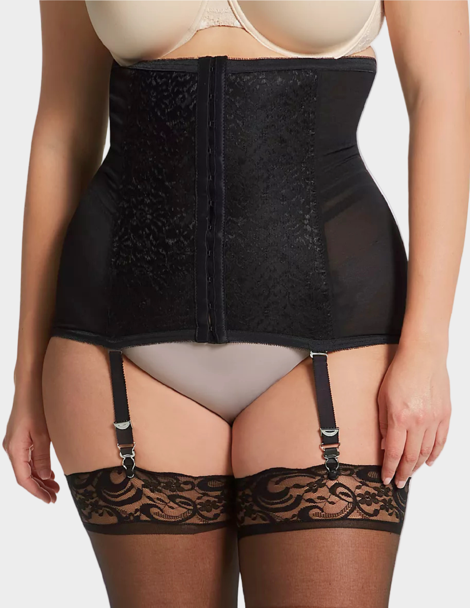 Front view of a curvy model wearing Rago 21 black waist trainer