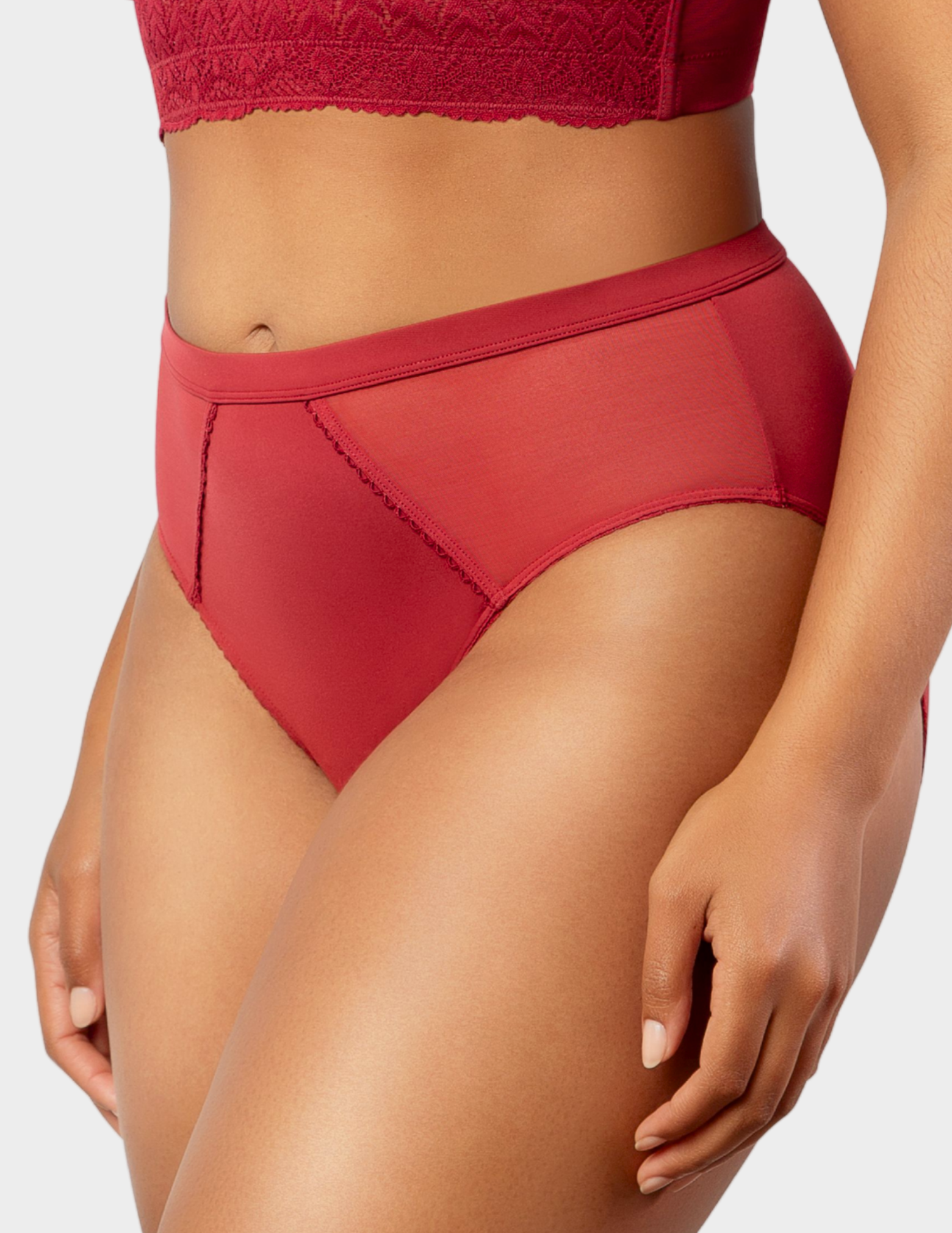 Side view of a model wearing Parfait Micro Dressy panty in rio red