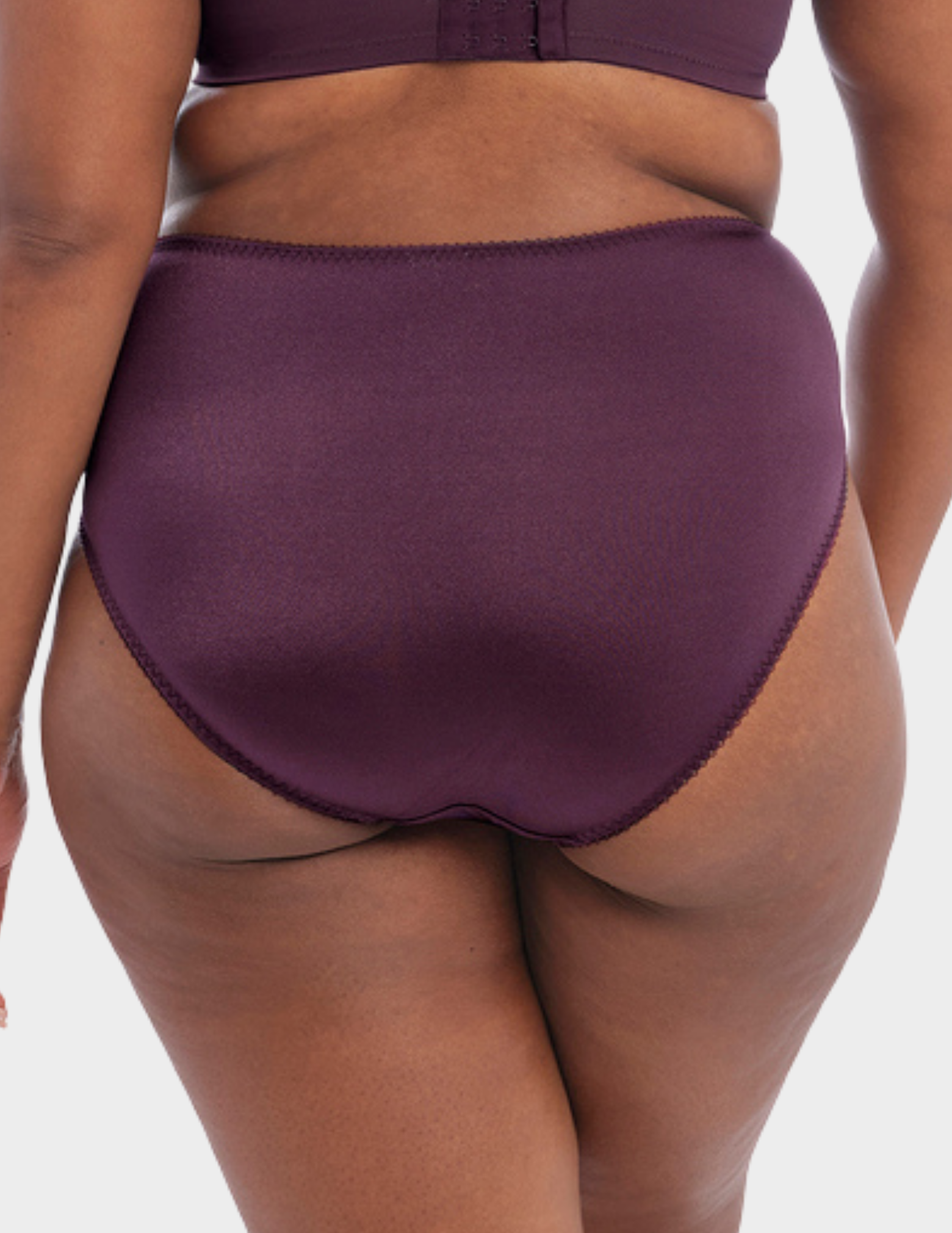 Back view of a model wearing Goddess Keira brief in Damson