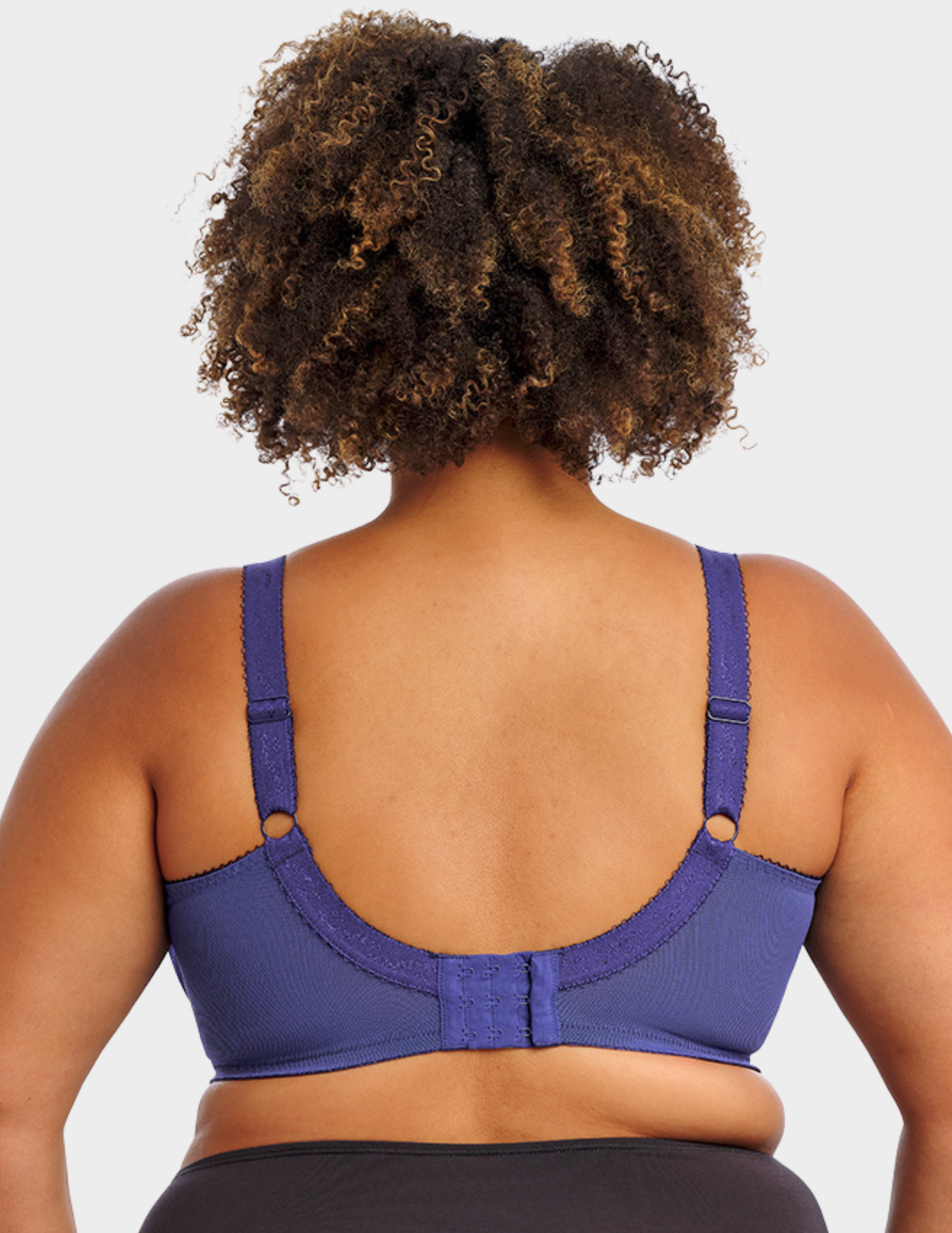 Back view of a model wearing Goddess Keira bra in ink