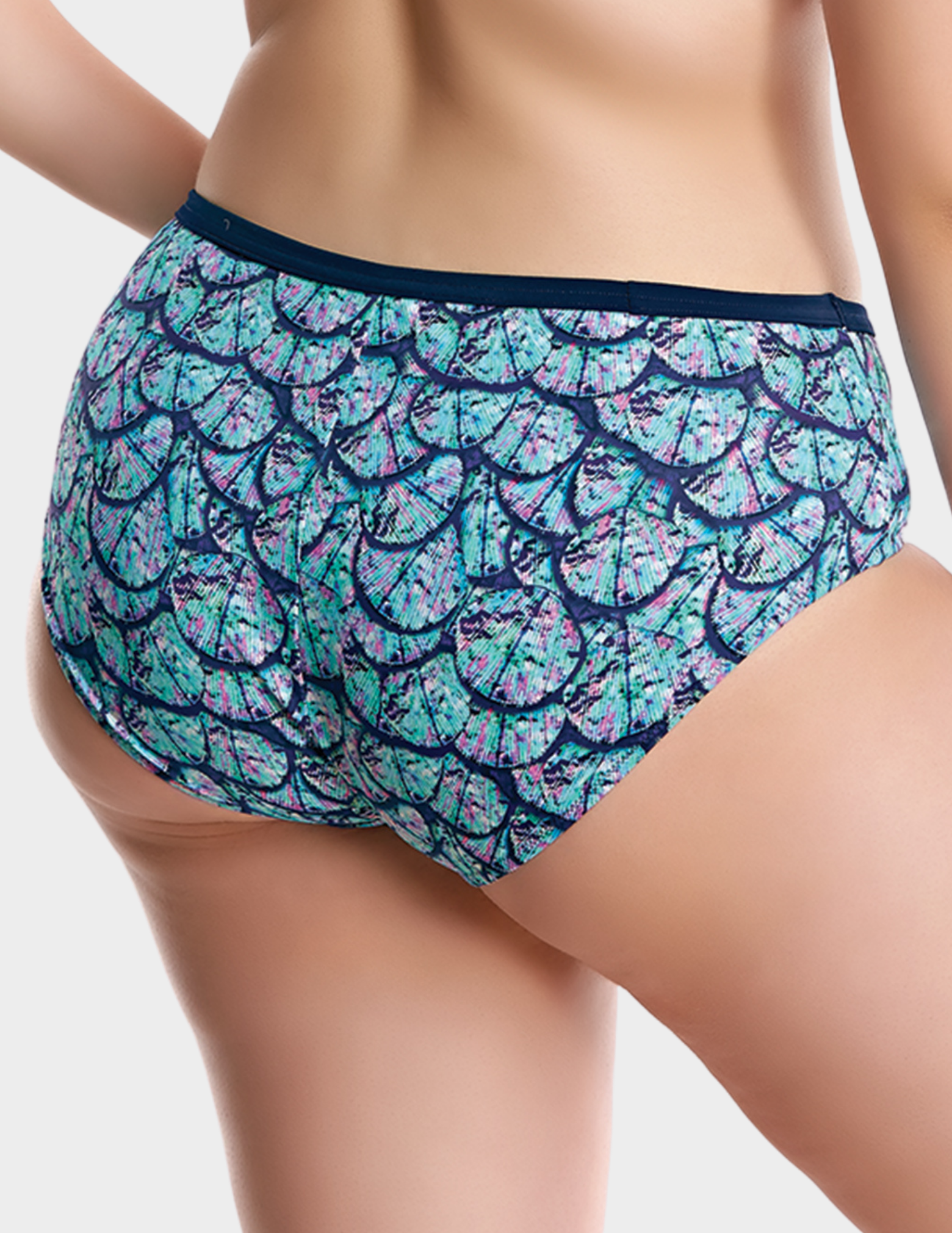 Back view of a model wearing Elomi Abalone swim brief in Midnight