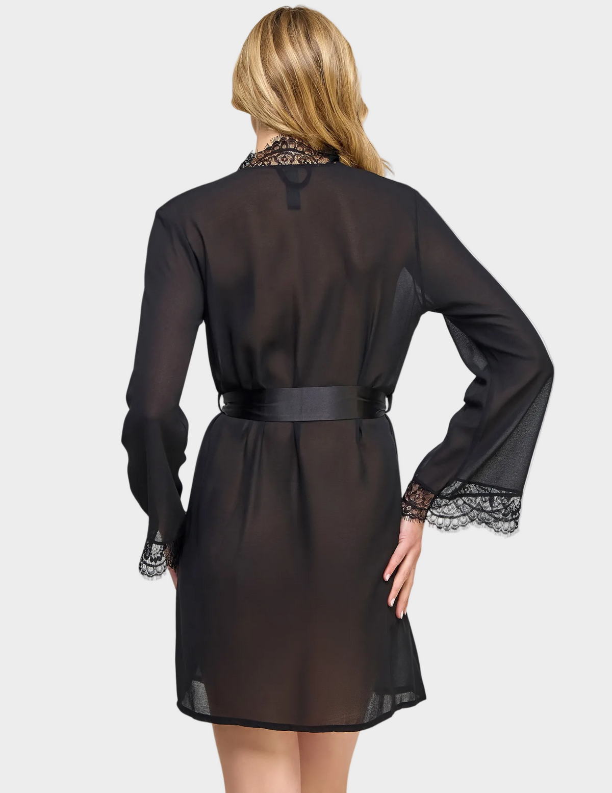 Back view of a model wearing a semi-sheer black robe with lace trim