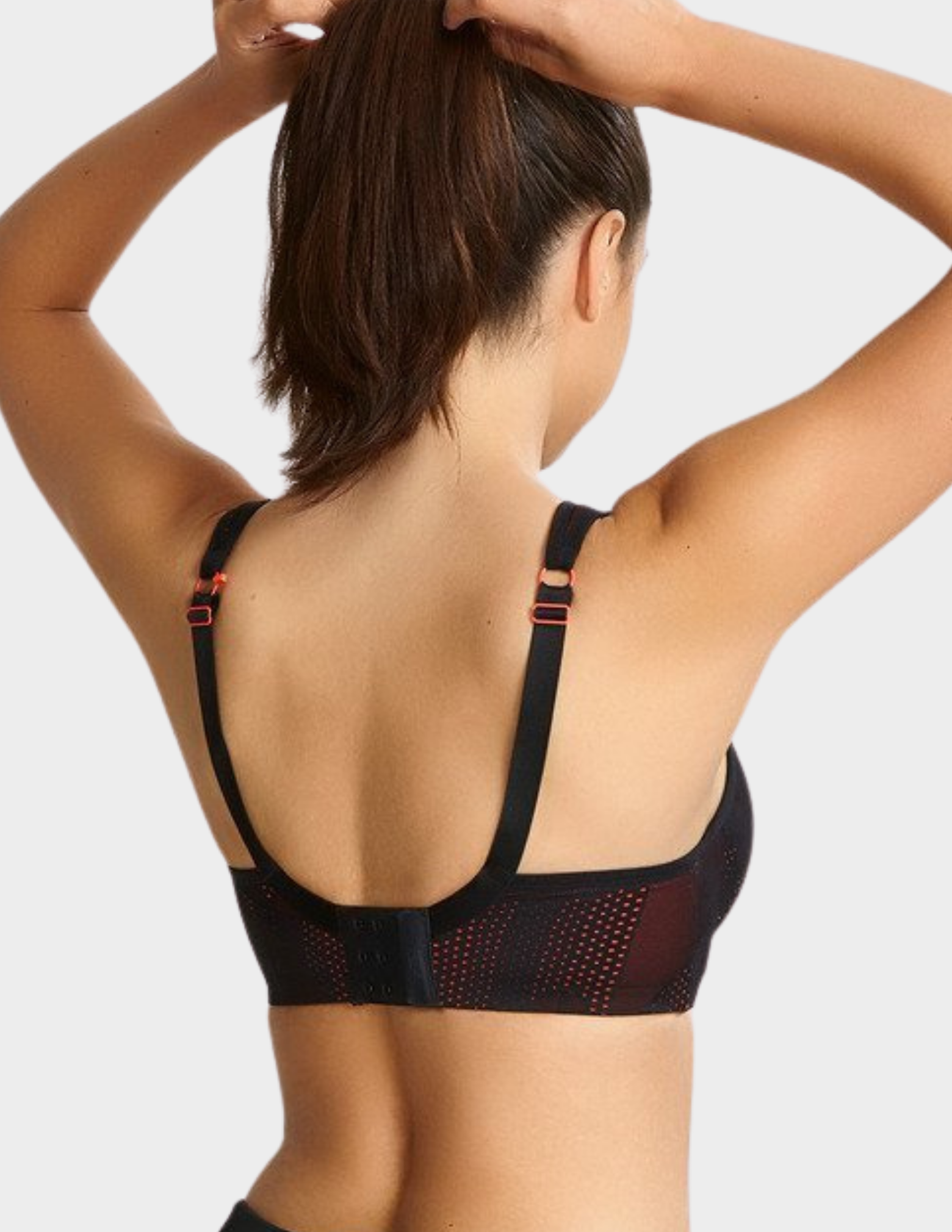 Back view of a model wearing Panache Power sports bra in Black Coral