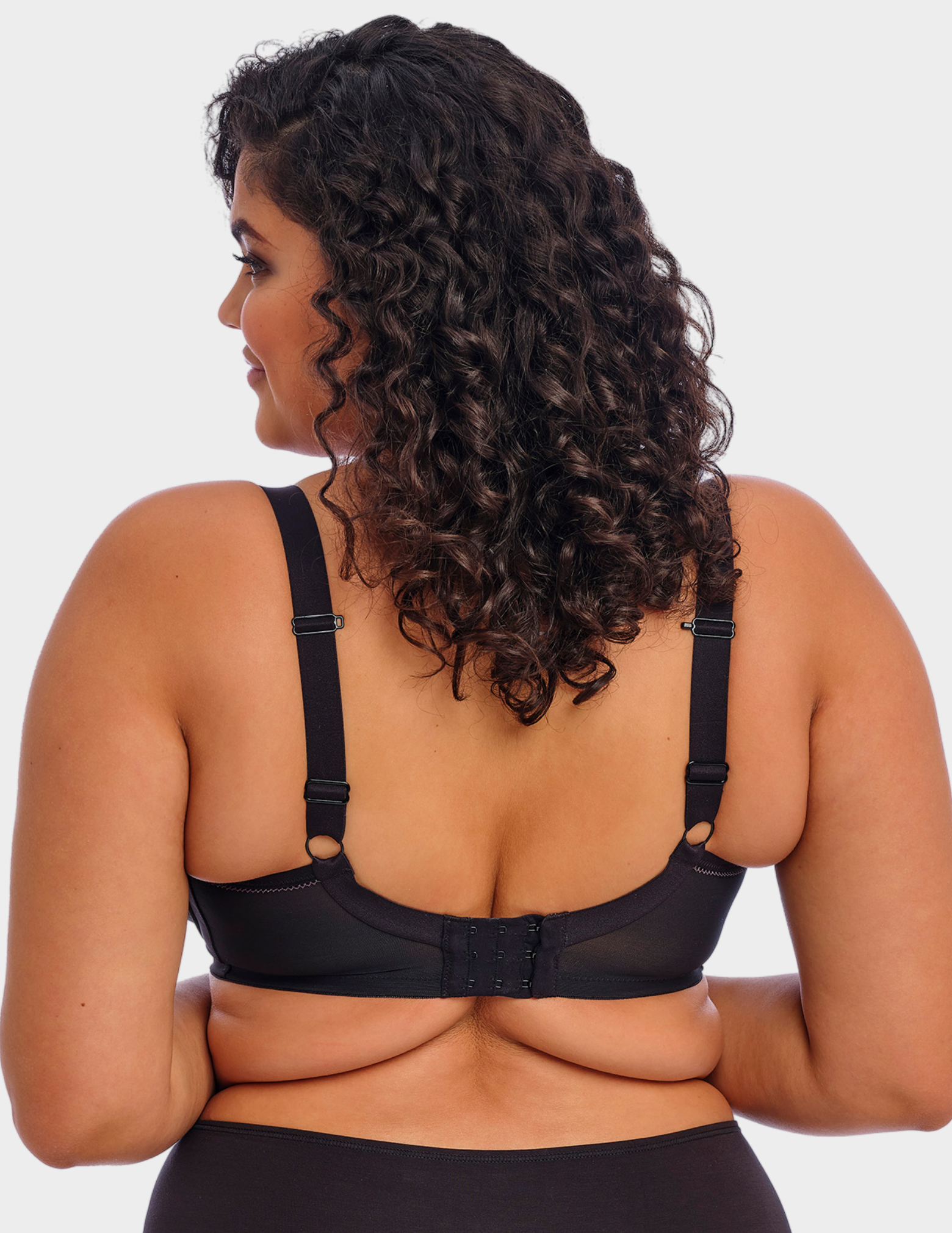 Back view of a model wearing Elomi Bijou plunge bra in black