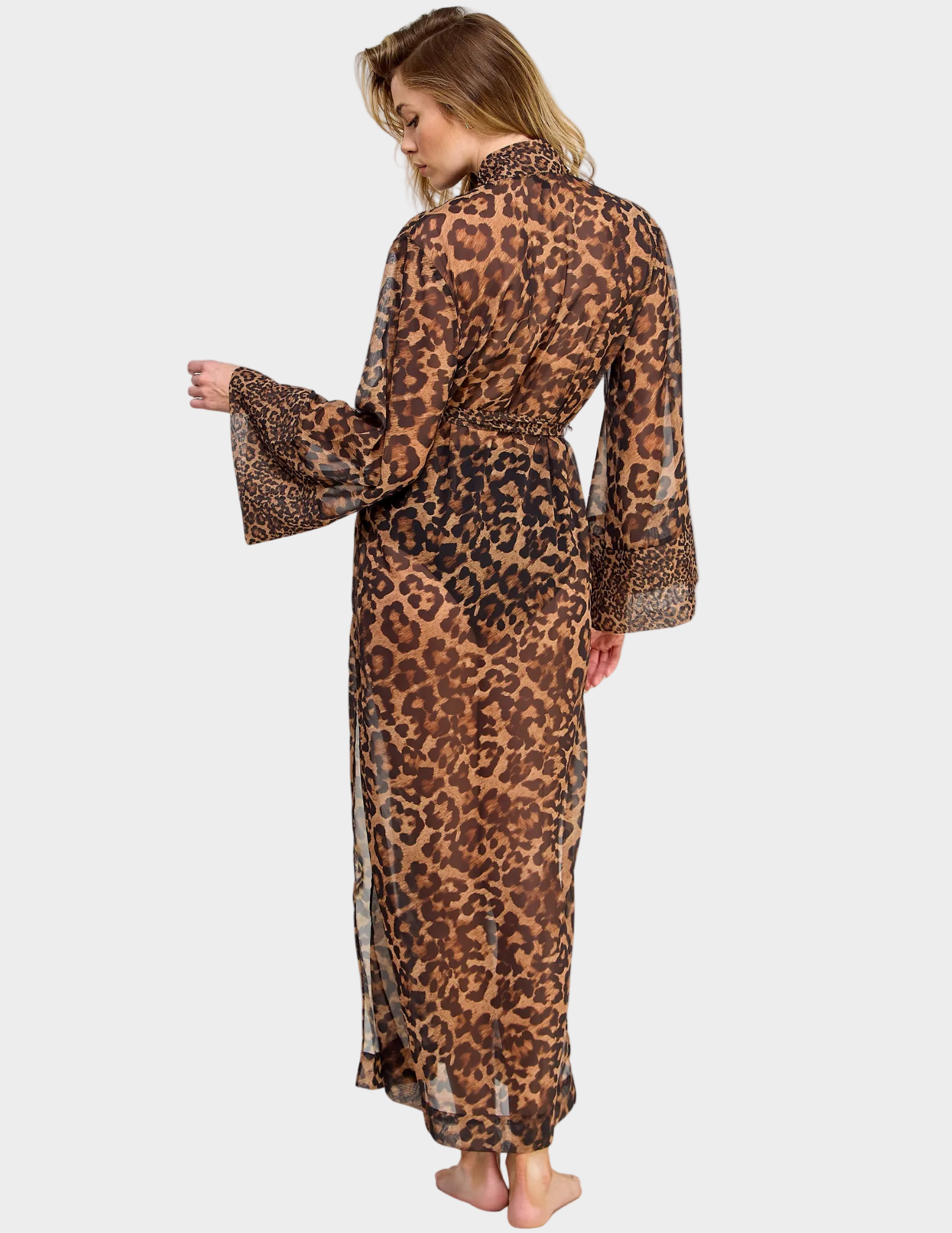 Back view of a model wearing a sheer leopard print robe
