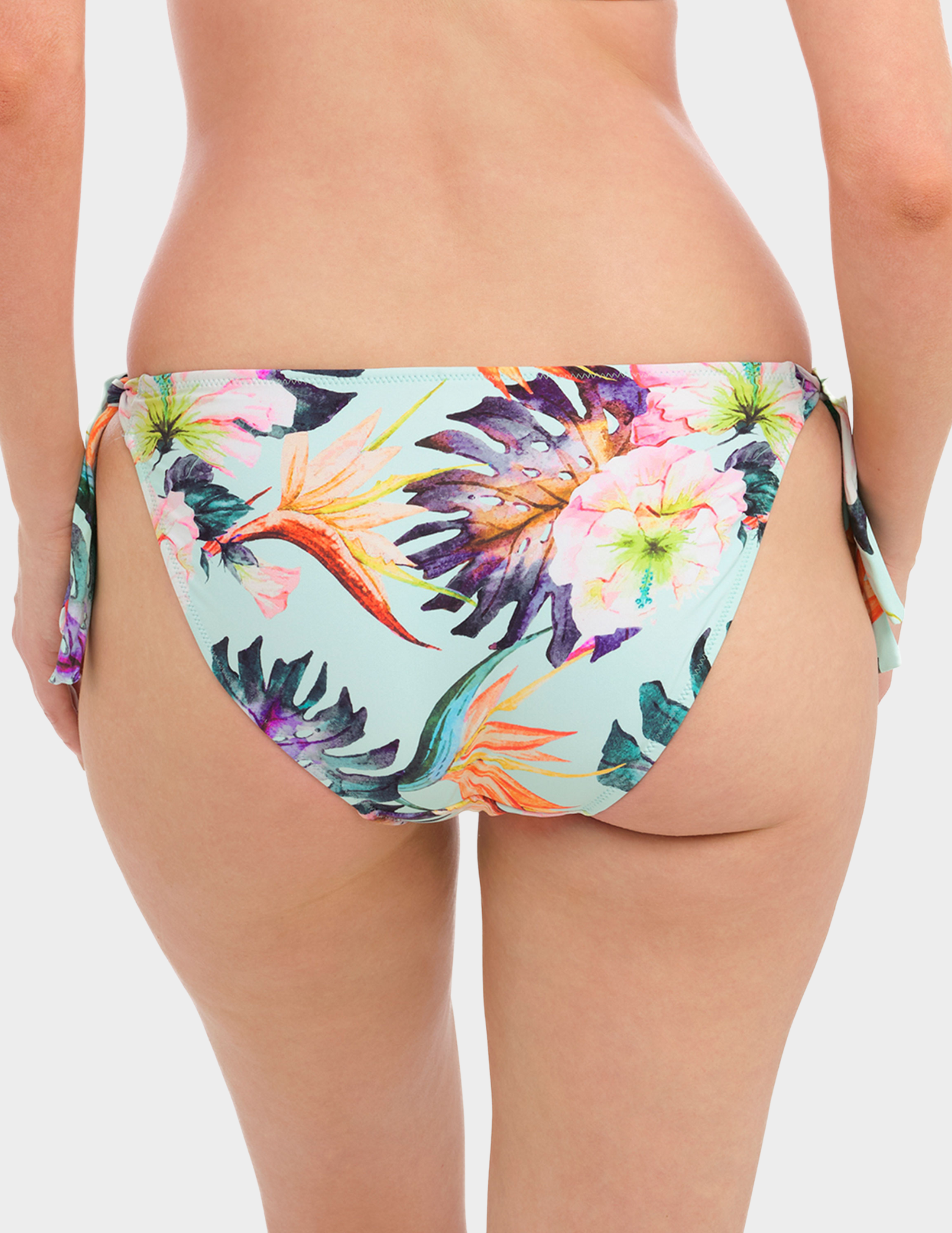 Back view of a model wearing Fantasie Paradiso tie swim brief in Soft Mint