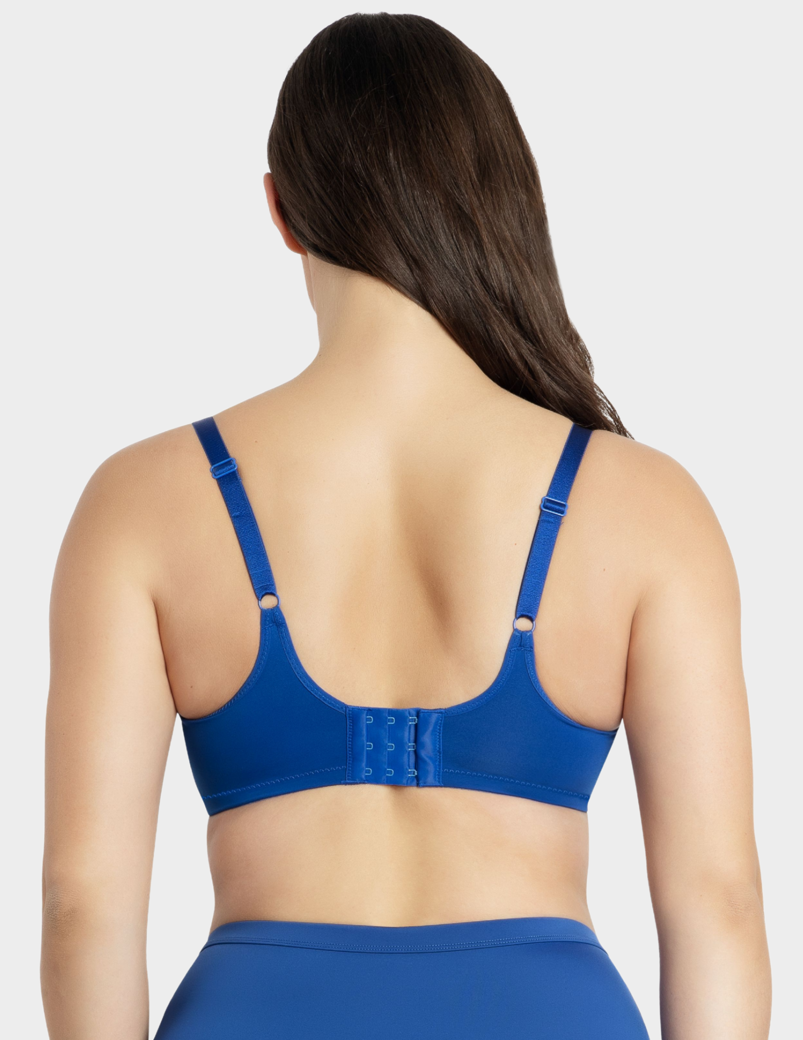 Back view of a model wearing Parfait Enora minimizer bra in Sapphire