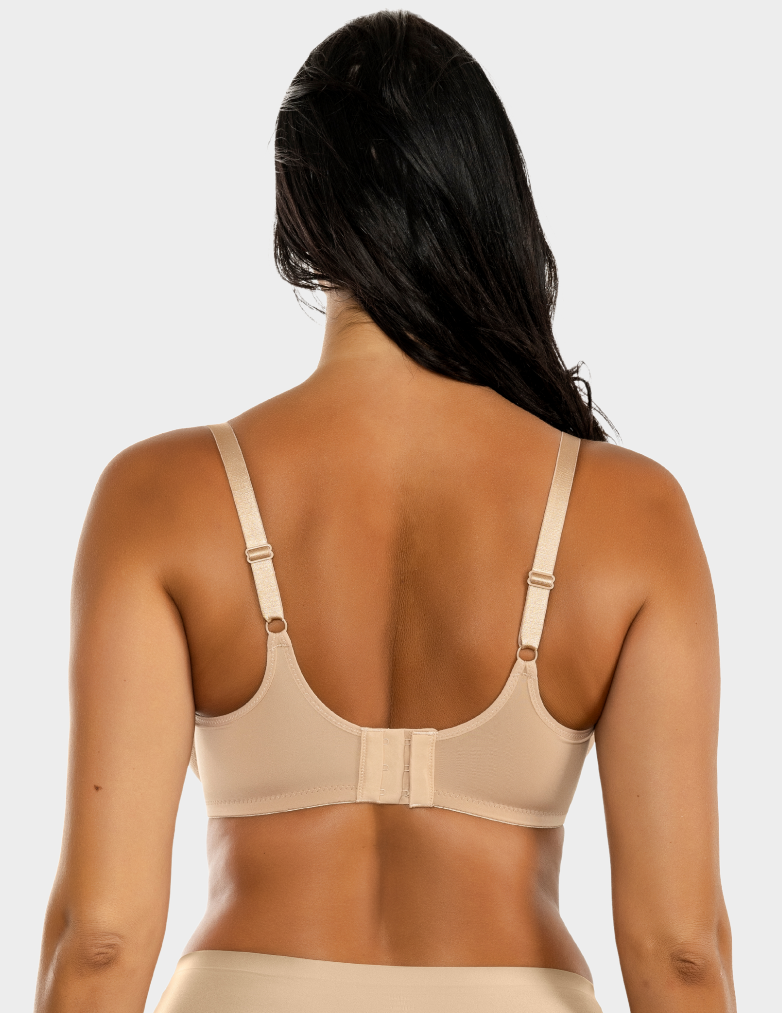 Back view of a model wearing Parfait Enora minimizer bra in European Nude