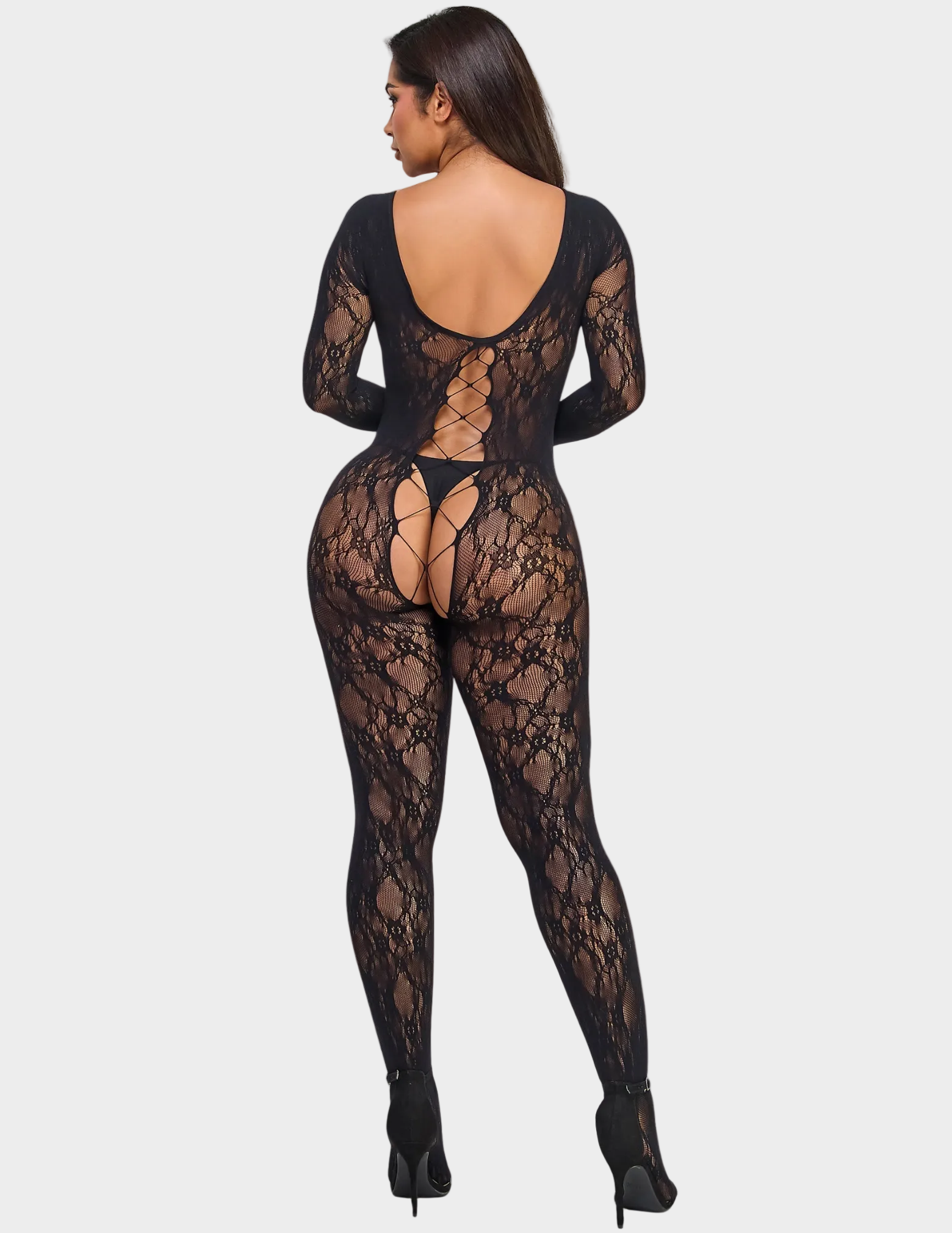 Back view of a model wearing a lace bodystocking