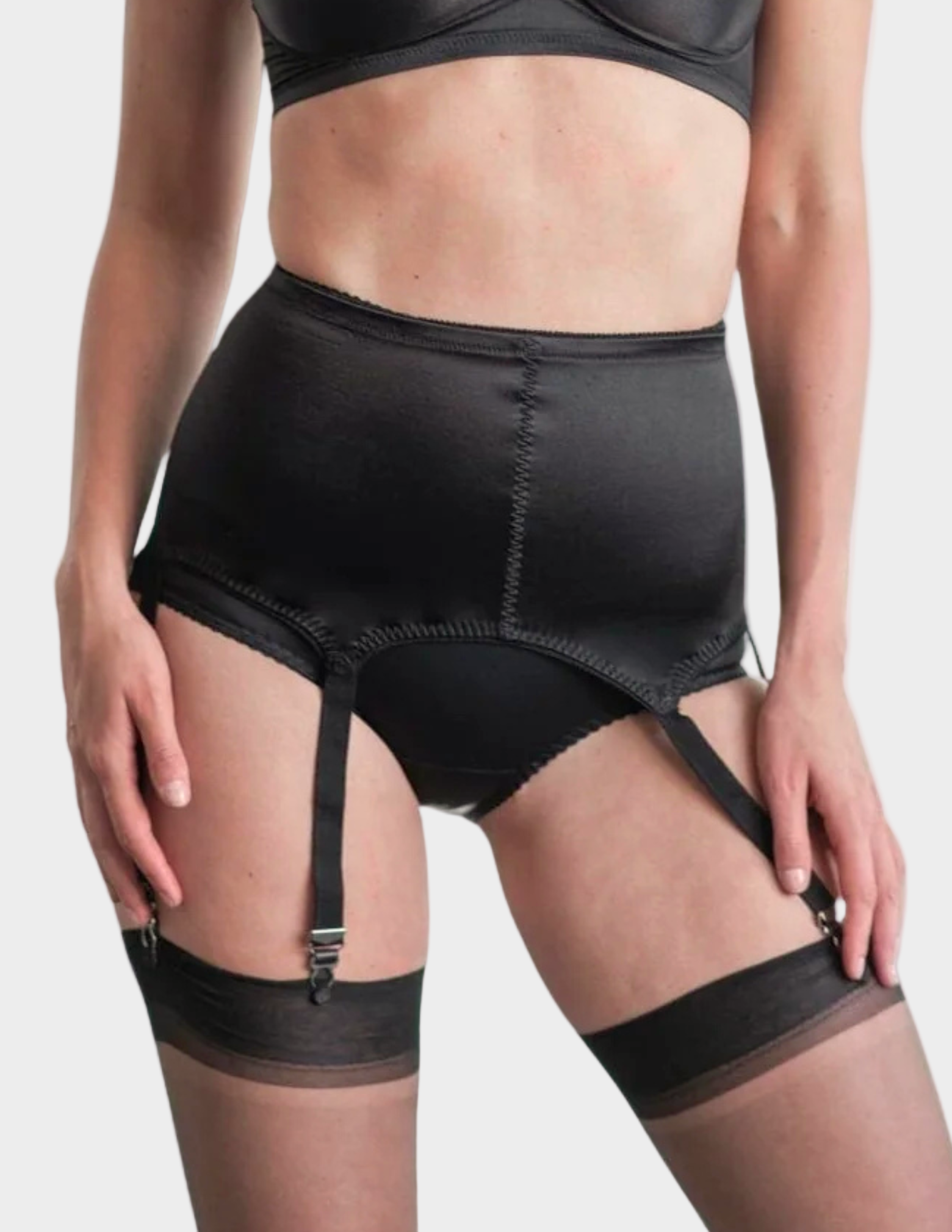 Front view of a model wearing Rago 3184 black six strap garter belt