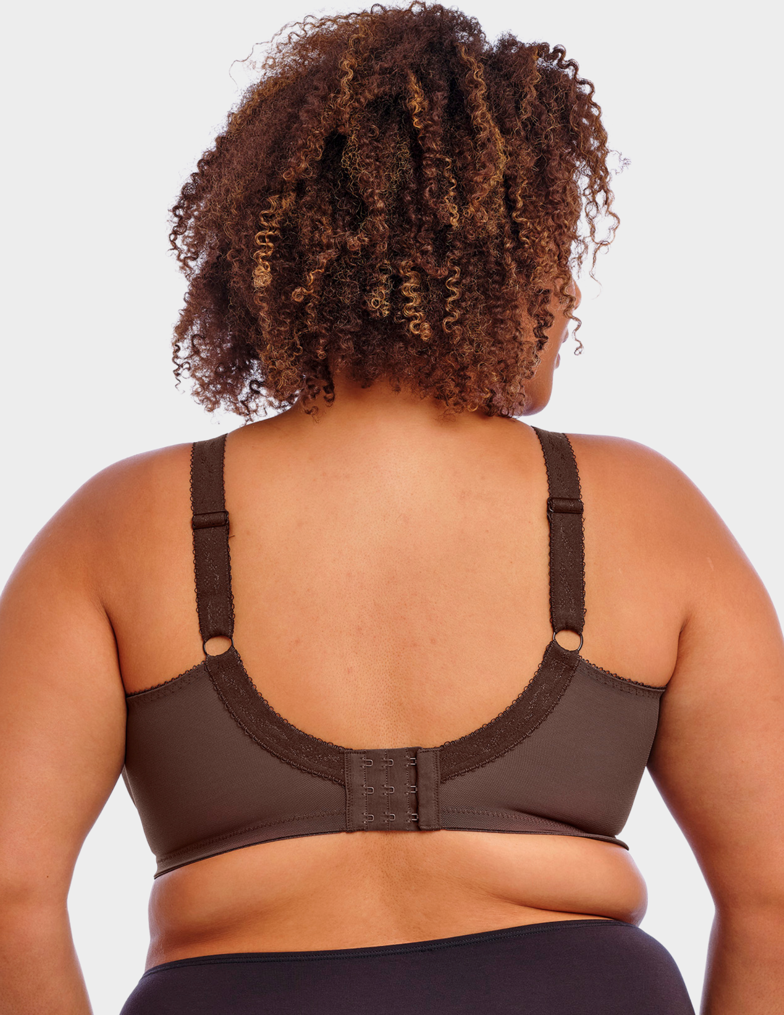 Back view of a model wearing Goddess Keira bra in chocolate