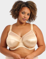 Front view of a model wearing Goddess Keira bra in nude