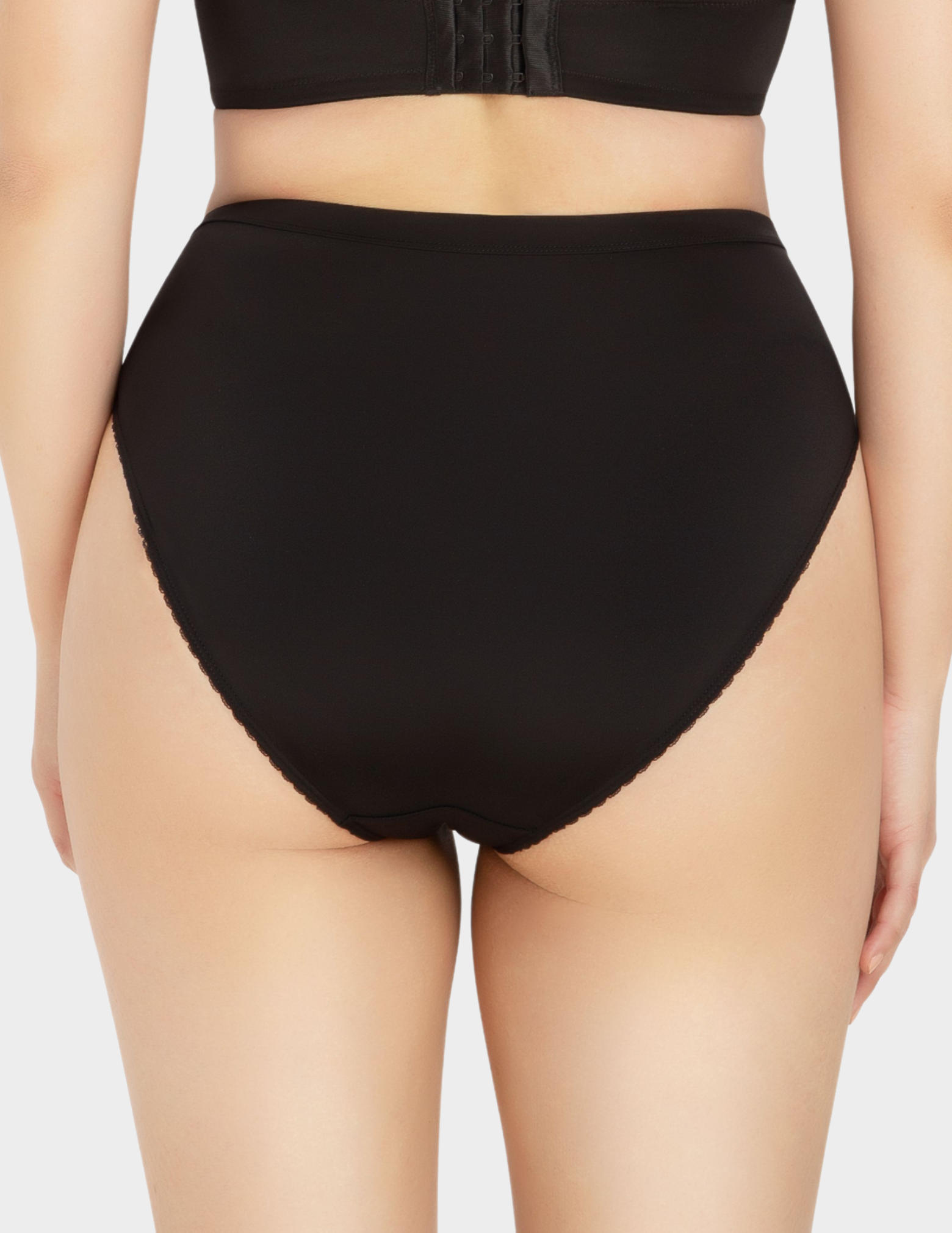 Back view of a model wearing Parfait Micro Dressy panty in black