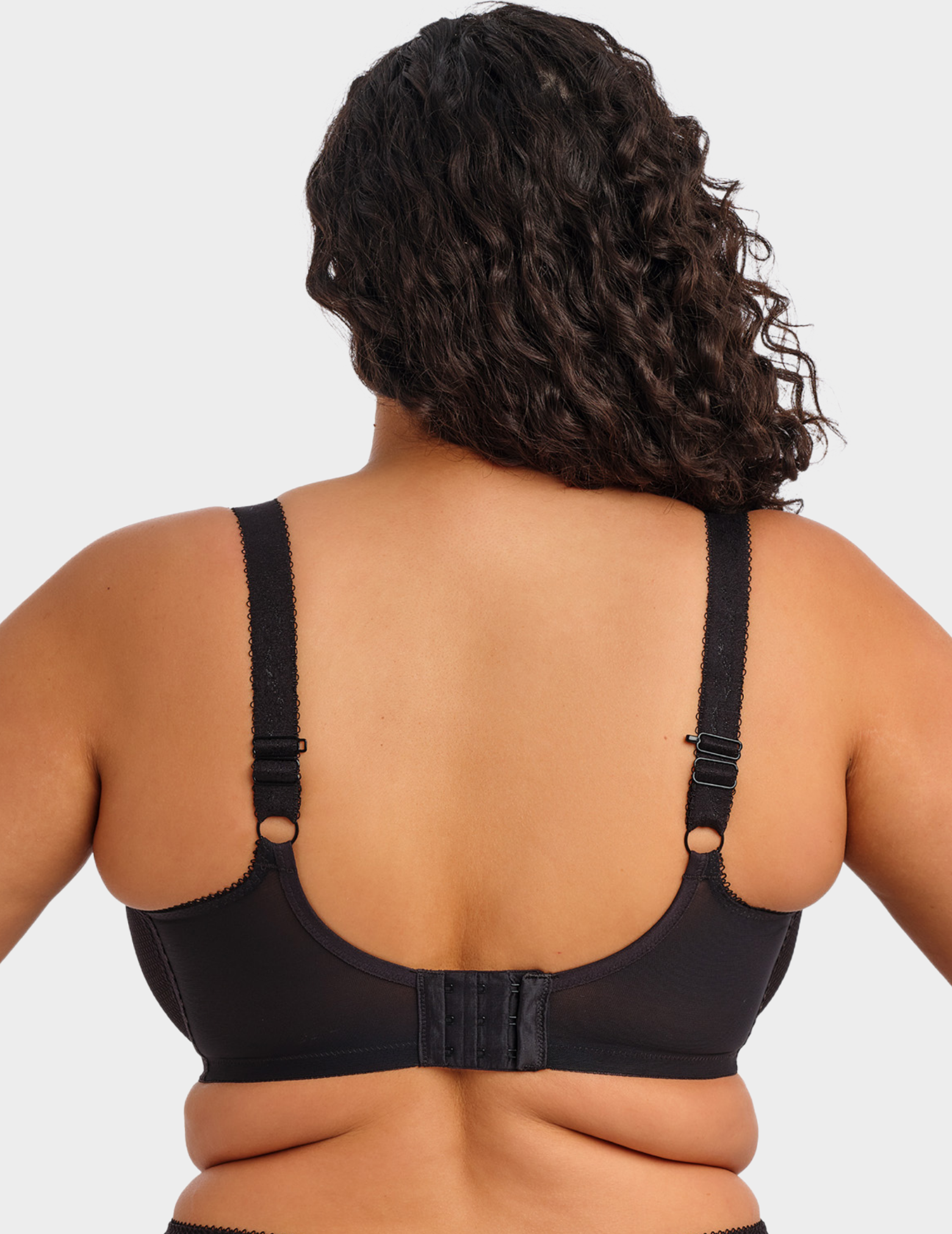 Back view of a model wearing Elomi Charley stretch plunge bra in black