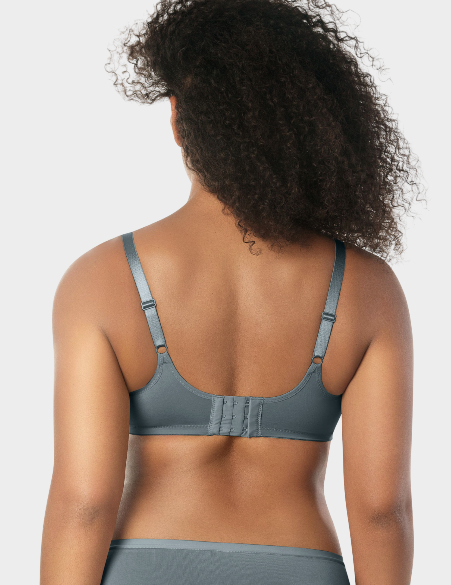 Back view of a model wearing Parfait Enora minimizer bra in Charcoal