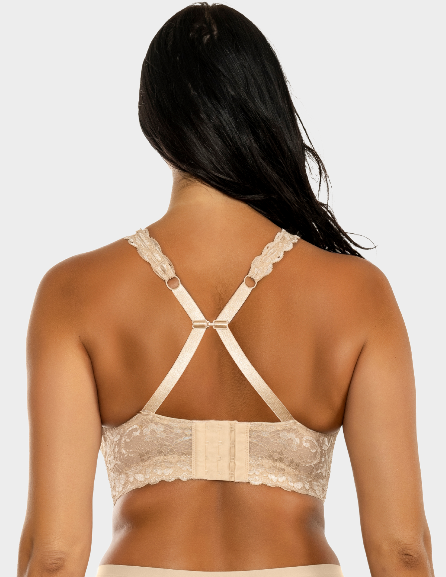 Back view of a model wearing Parfait Adriana bralette in Bare with straps hooked