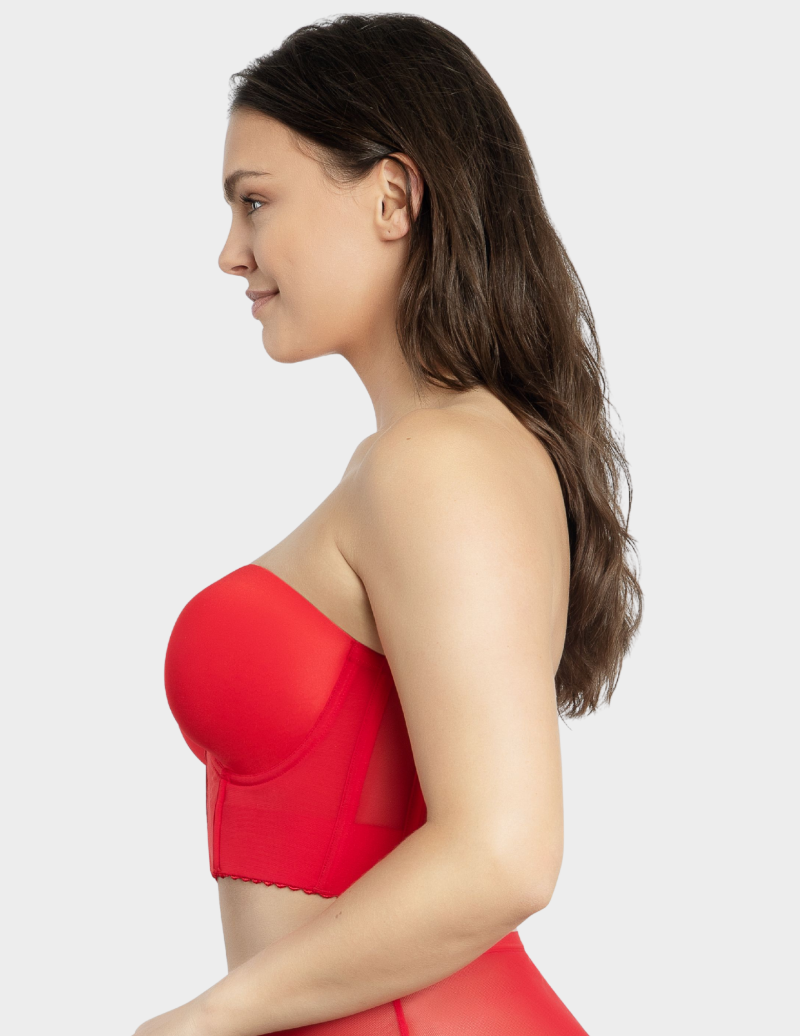 Side view of a model wearing Parfait Shea bustier bra in racing red