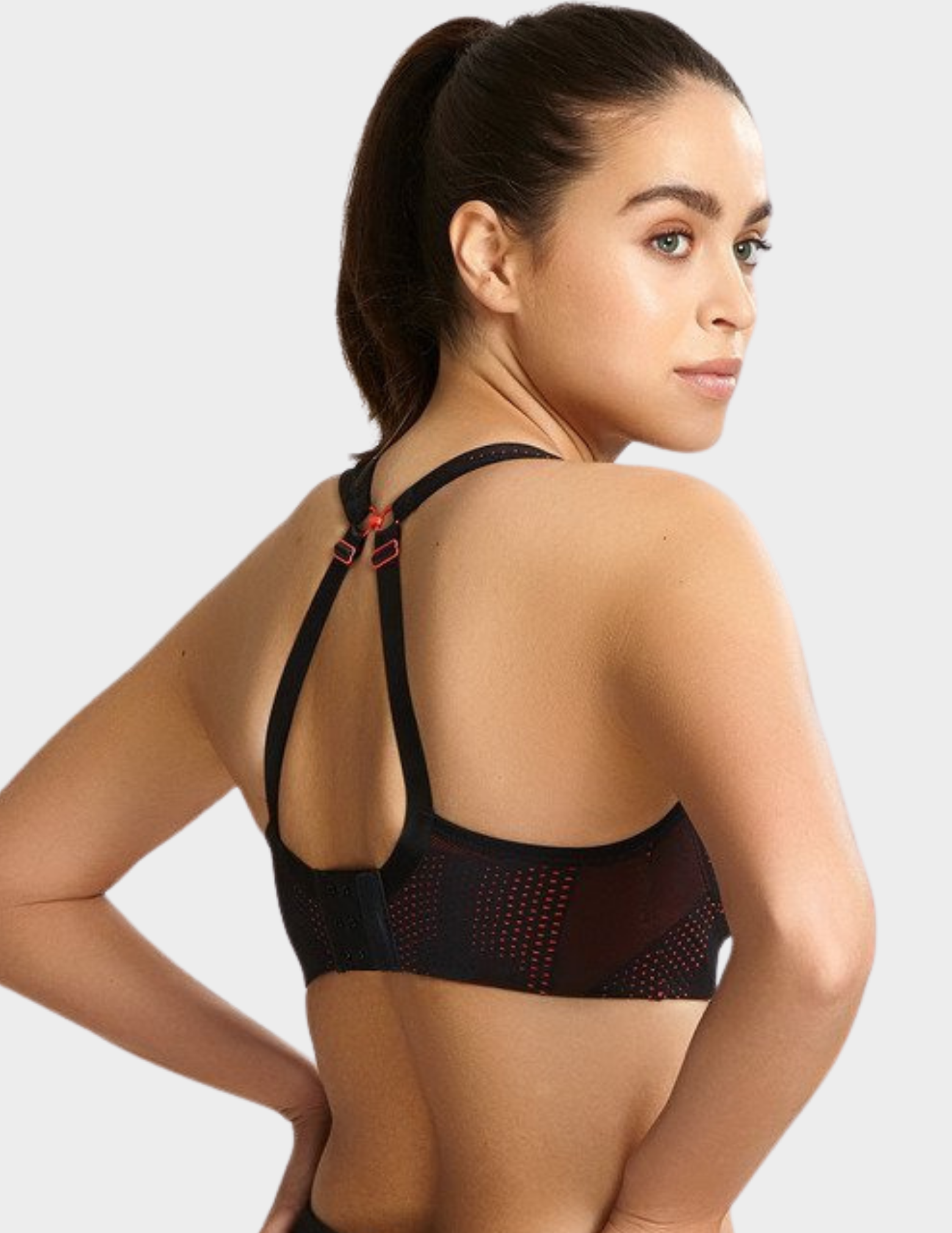 Back view of a model wearing Panache Power sports bra in Black Coral with straps hooked