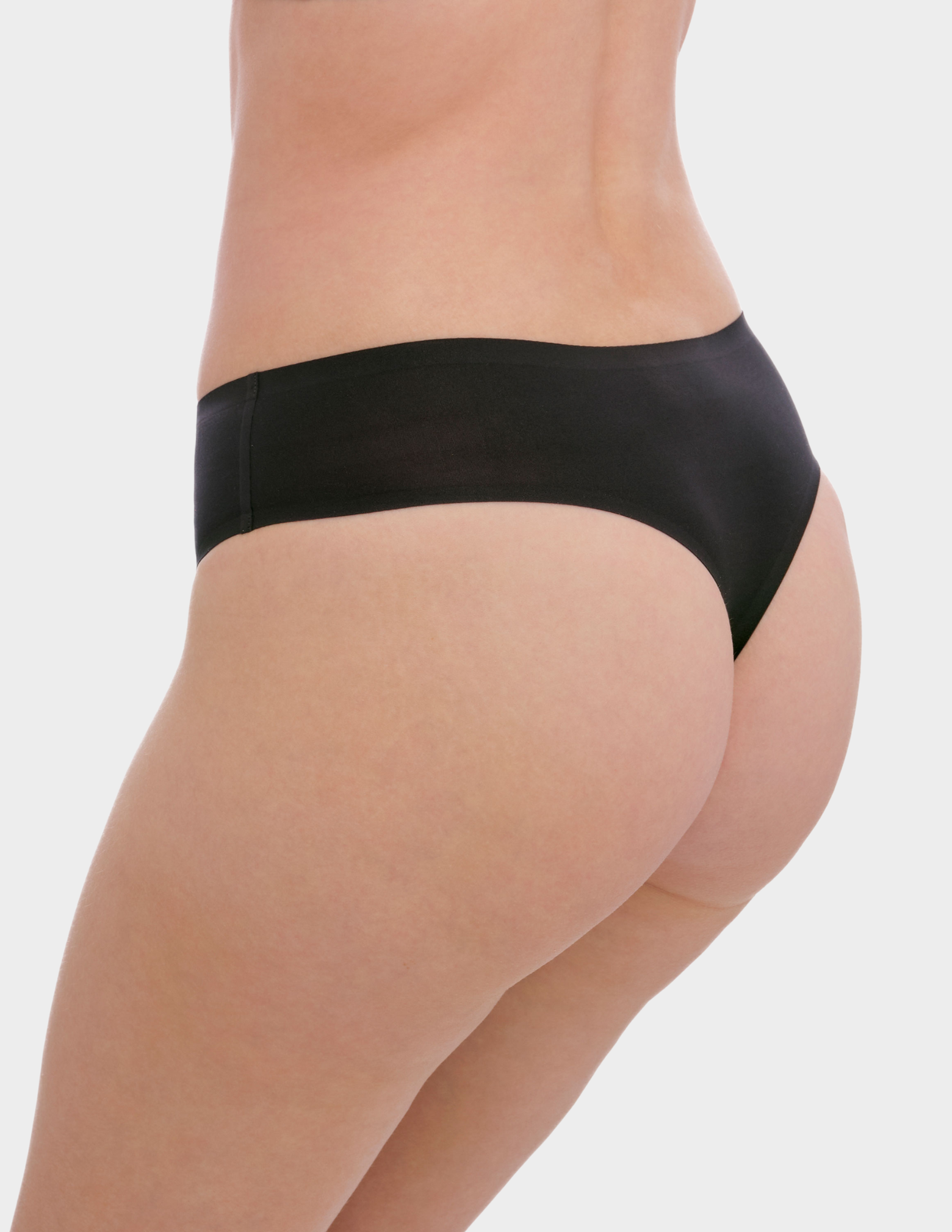Side view of a model wearing Fantasie Smoothease thong in Black
